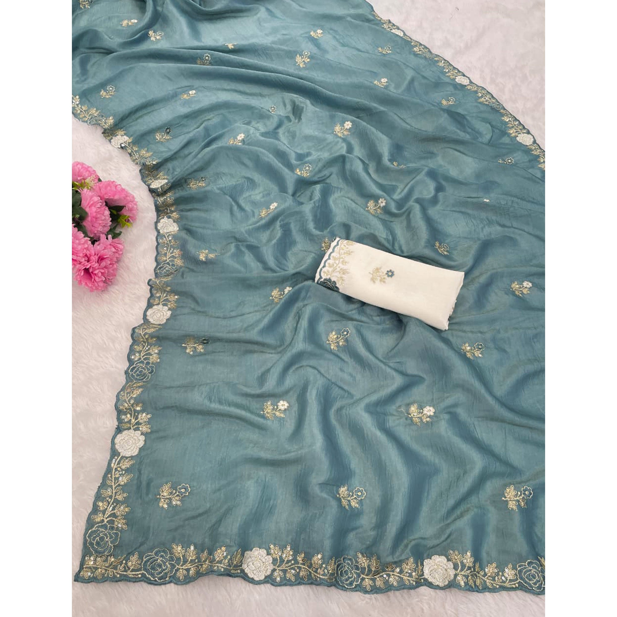 Blue Lightweight Georgette Crush Saree Adorned with Delicate Floral Embroidery