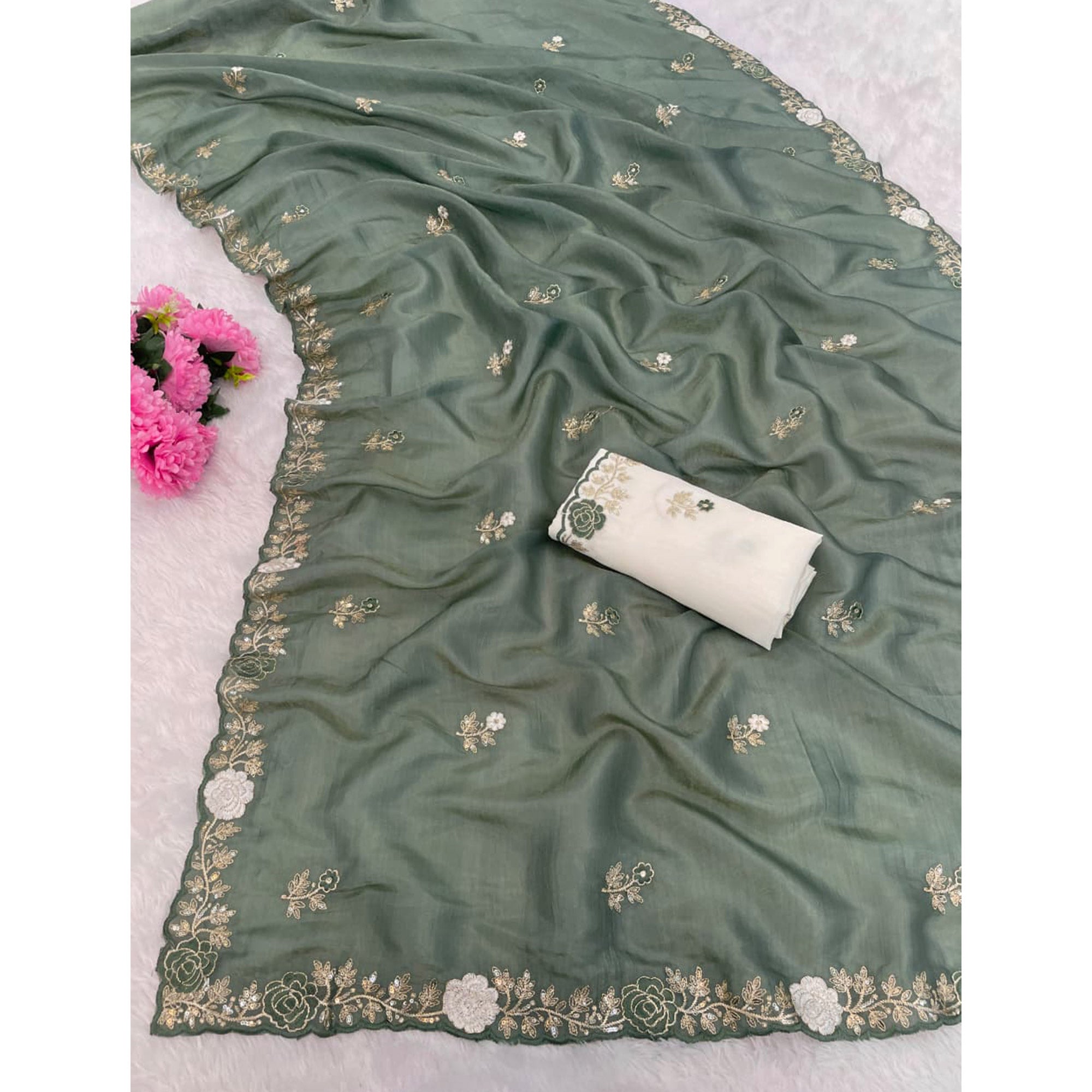 Green Lightweight Georgette Crush Saree Adorned with Delicate Floral Embroidery