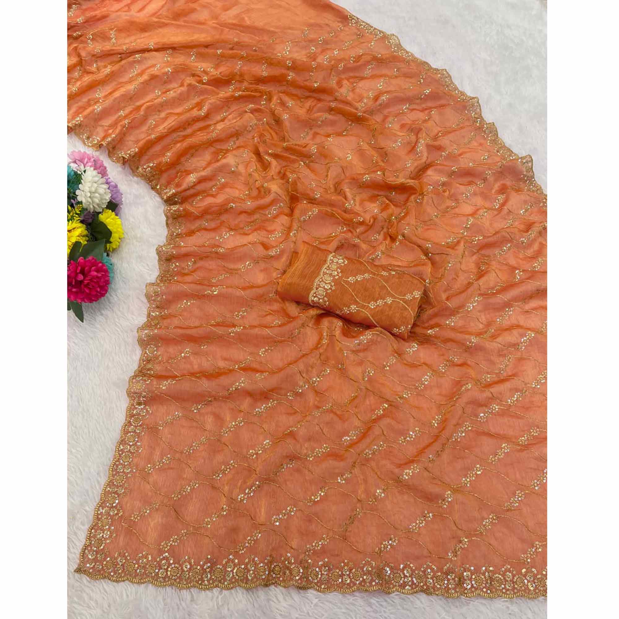 Orange Partywear Organza Chiffon Silk Saree Highlighted with Fine Sequins Detailing