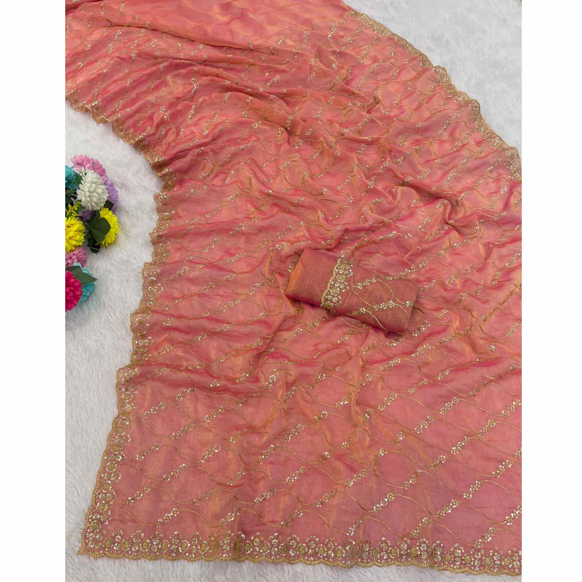 Peach Partywear Organza Chiffon Silk Saree Highlighted with Fine Sequins Detailing