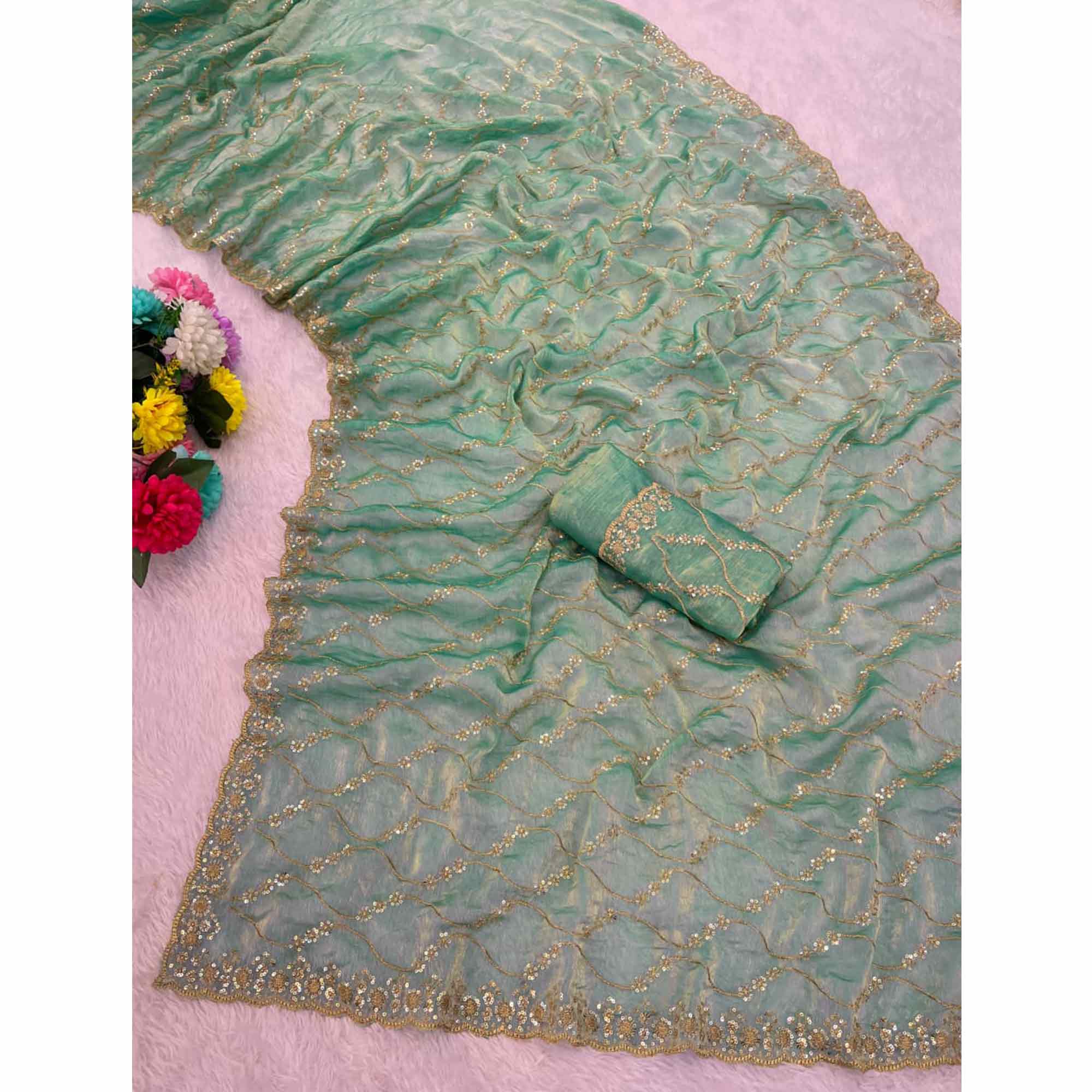 Sea Green Partywear Organza Chiffon Silk Saree Highlighted with Fine Sequins Detailing