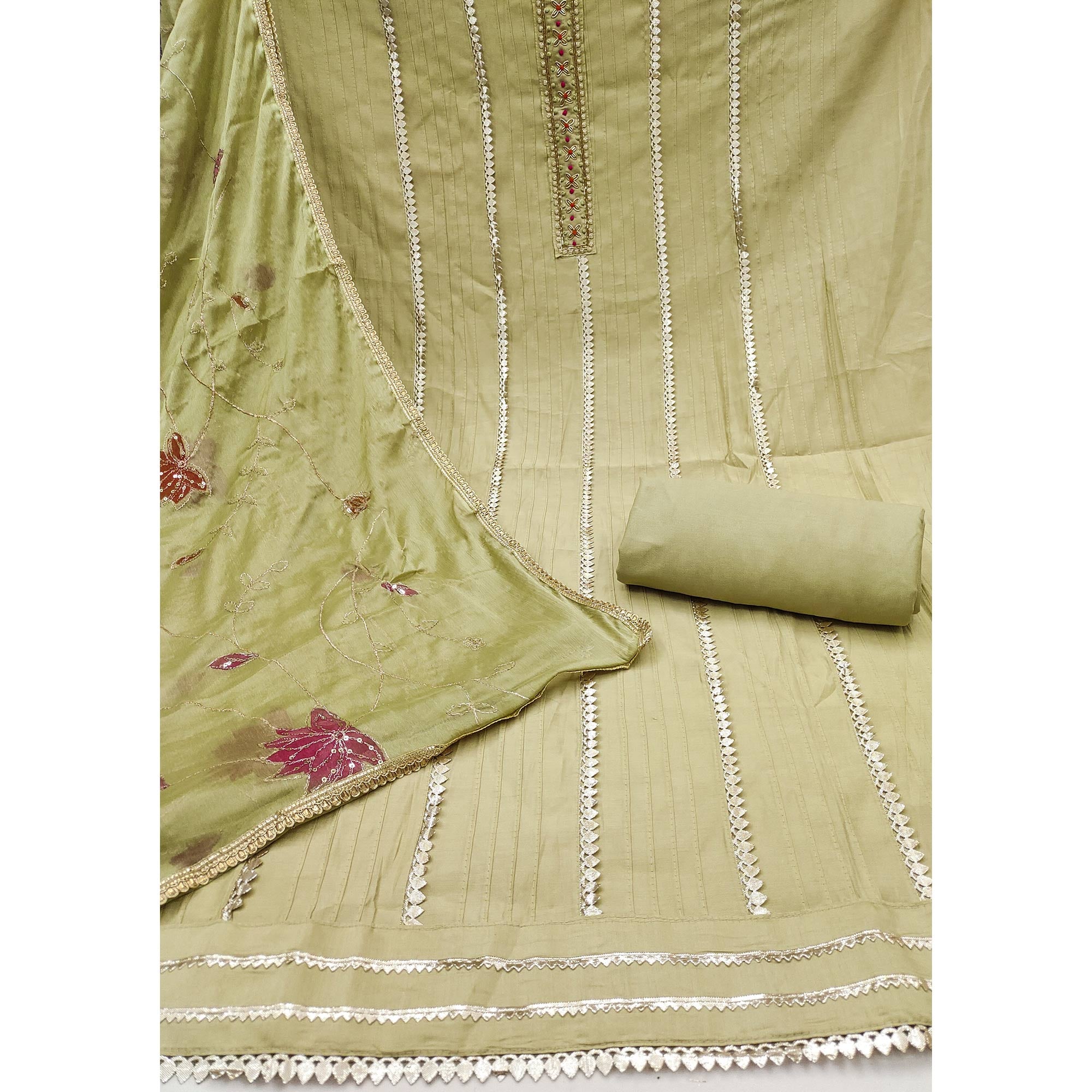 Green Cotton Silk Dress Material Embellished With Elegant Moti Handwork & Delicate Gota Patti Lace
