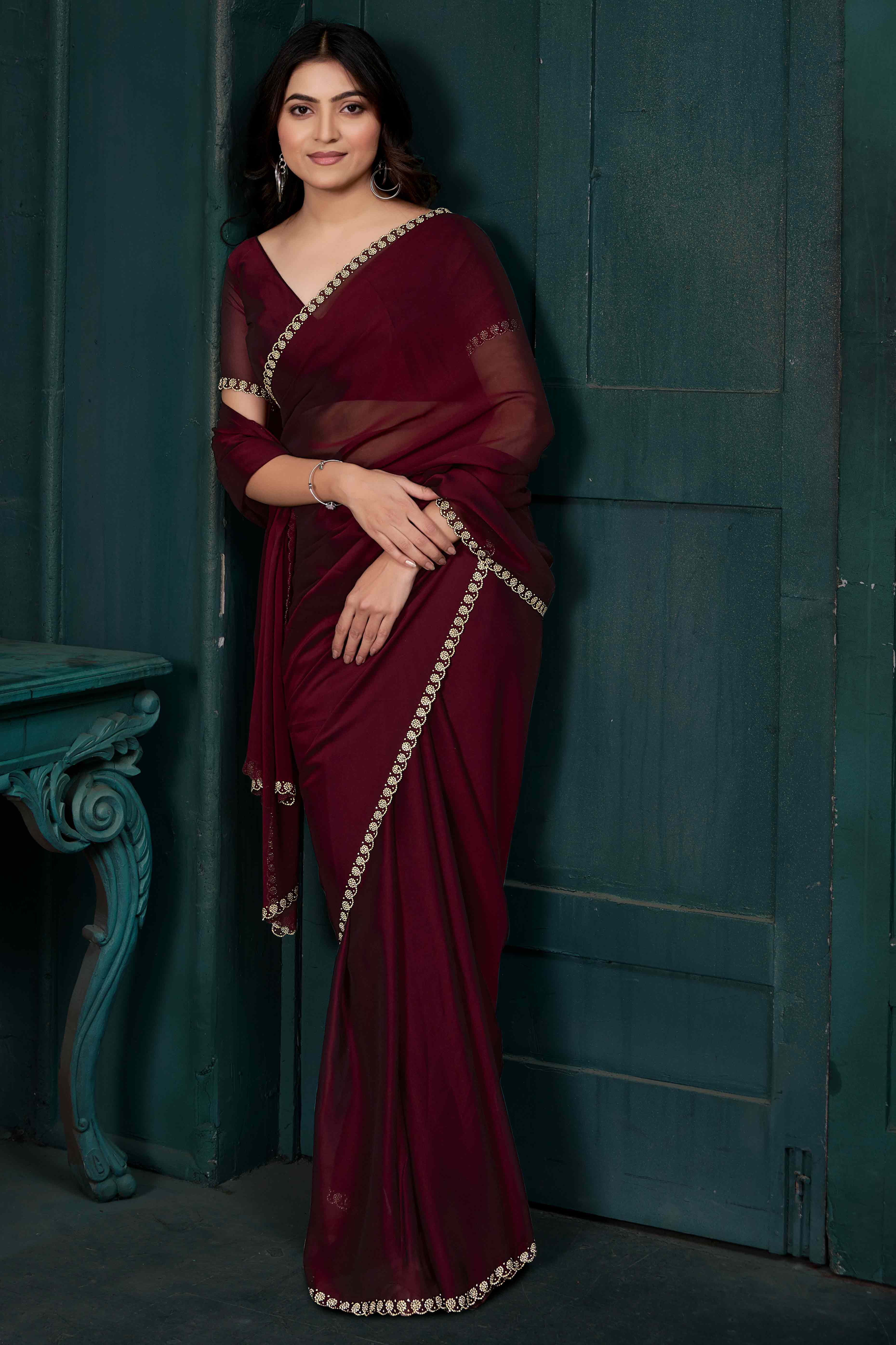 Maroon Crepe Silk Solid Saree with Elegant Zarkan Border Detailing