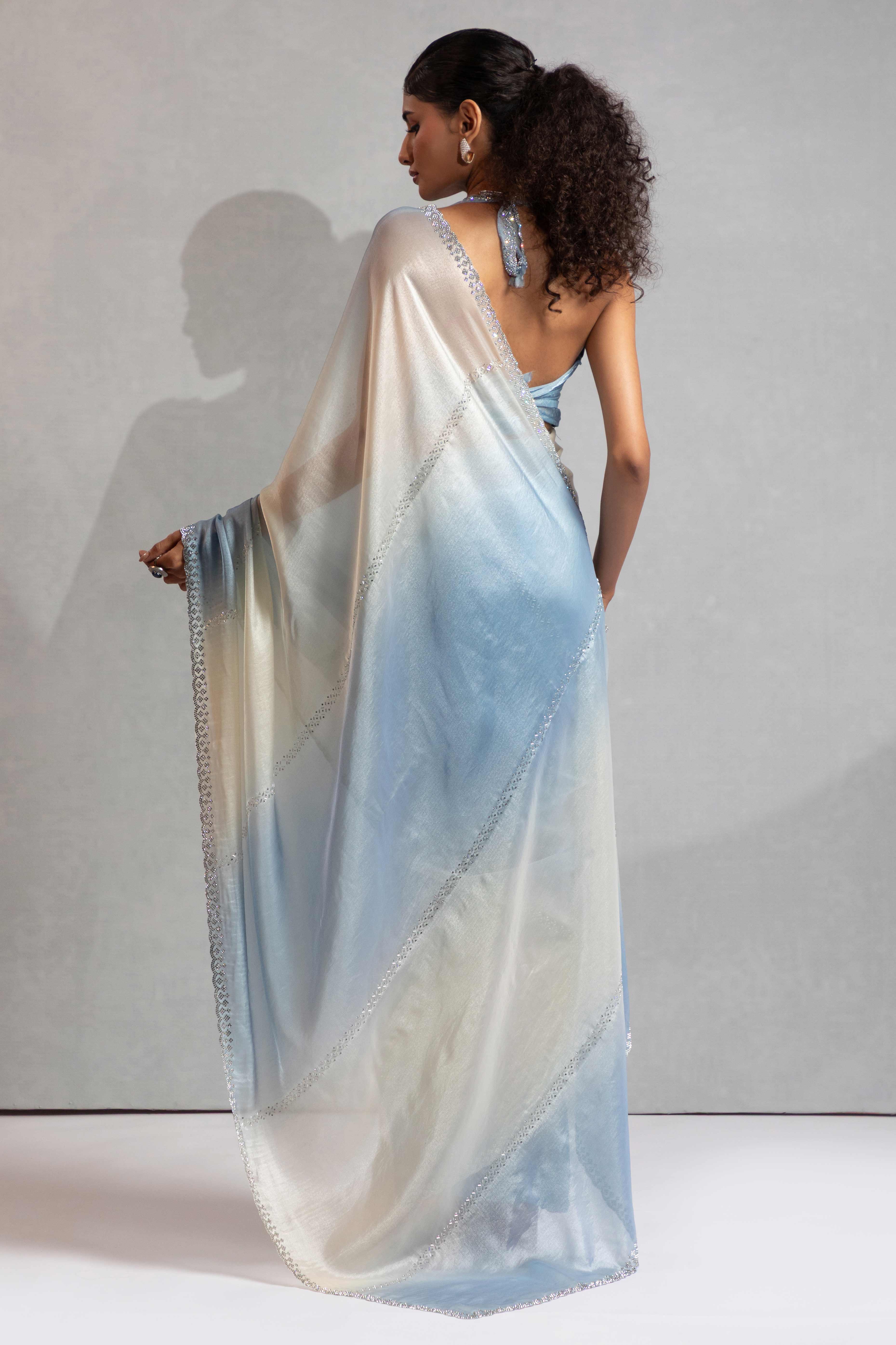 Blue & Off White Satin Silk Saree Decorated With Stone Embellishments