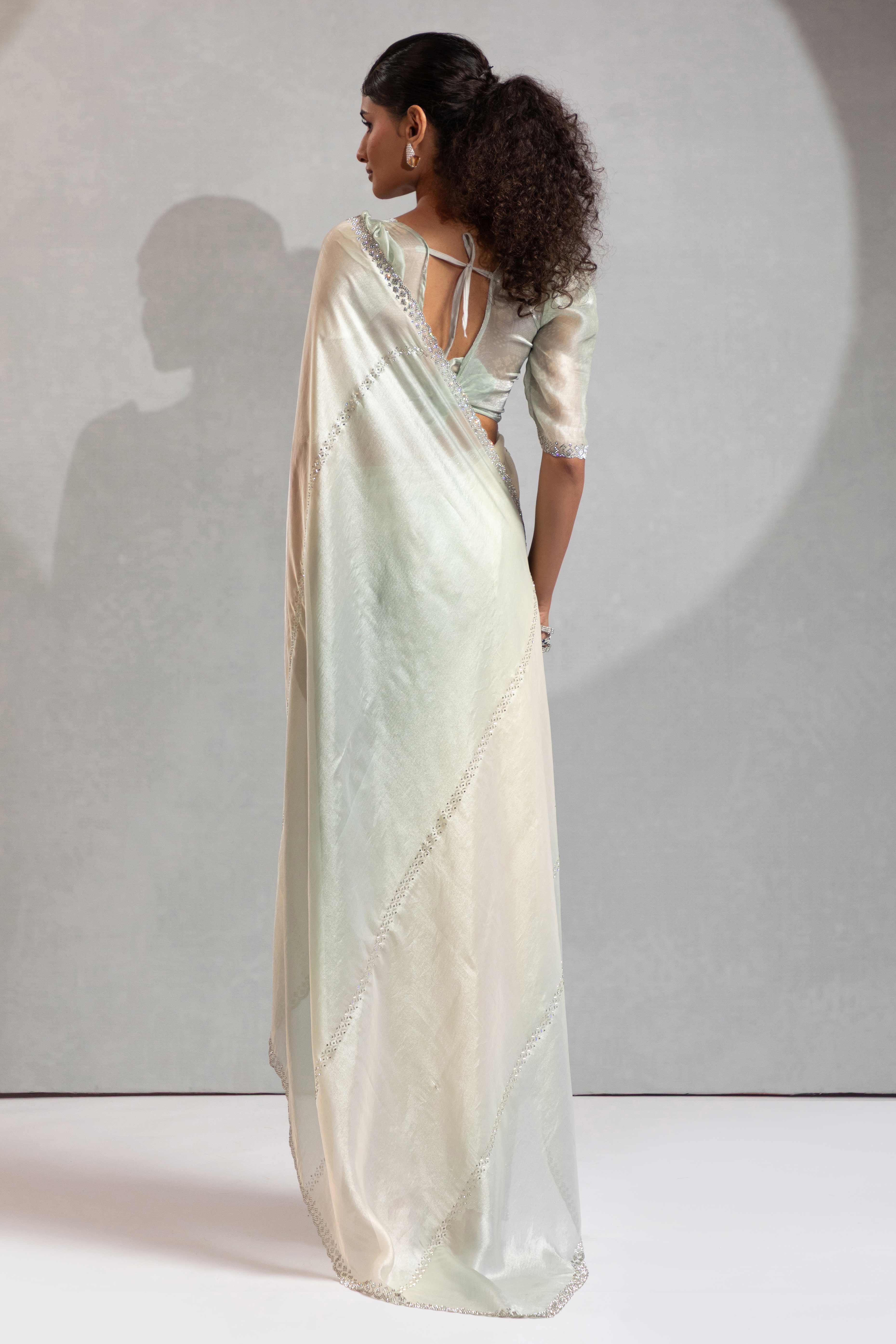 Celadon Green & Off White Satin Silk Saree Decorated With Stone Embellishments
