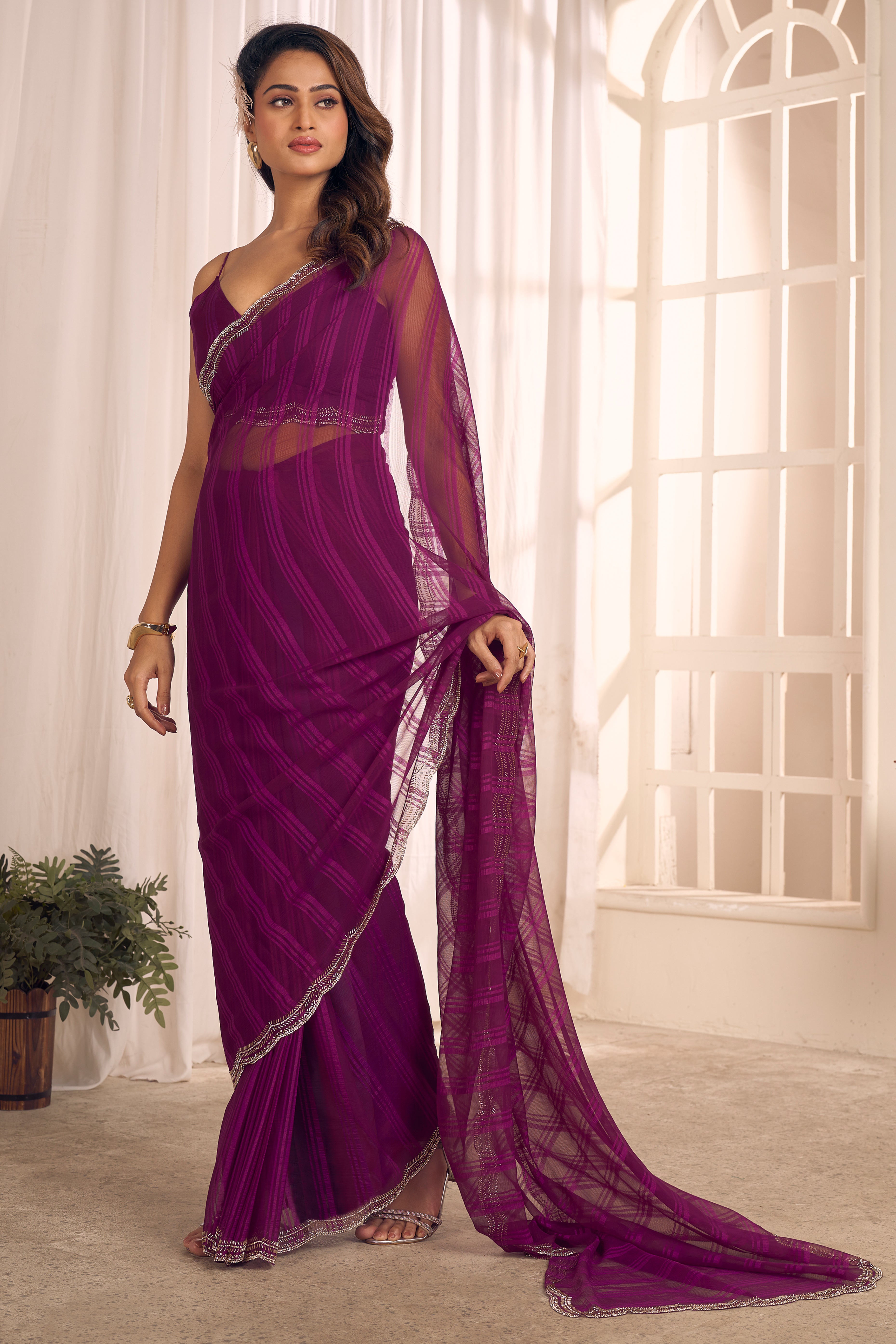 Wine Georgette Saree Featuring Contemporary Stripes With A Sparkling Diamond & Beads Work Border