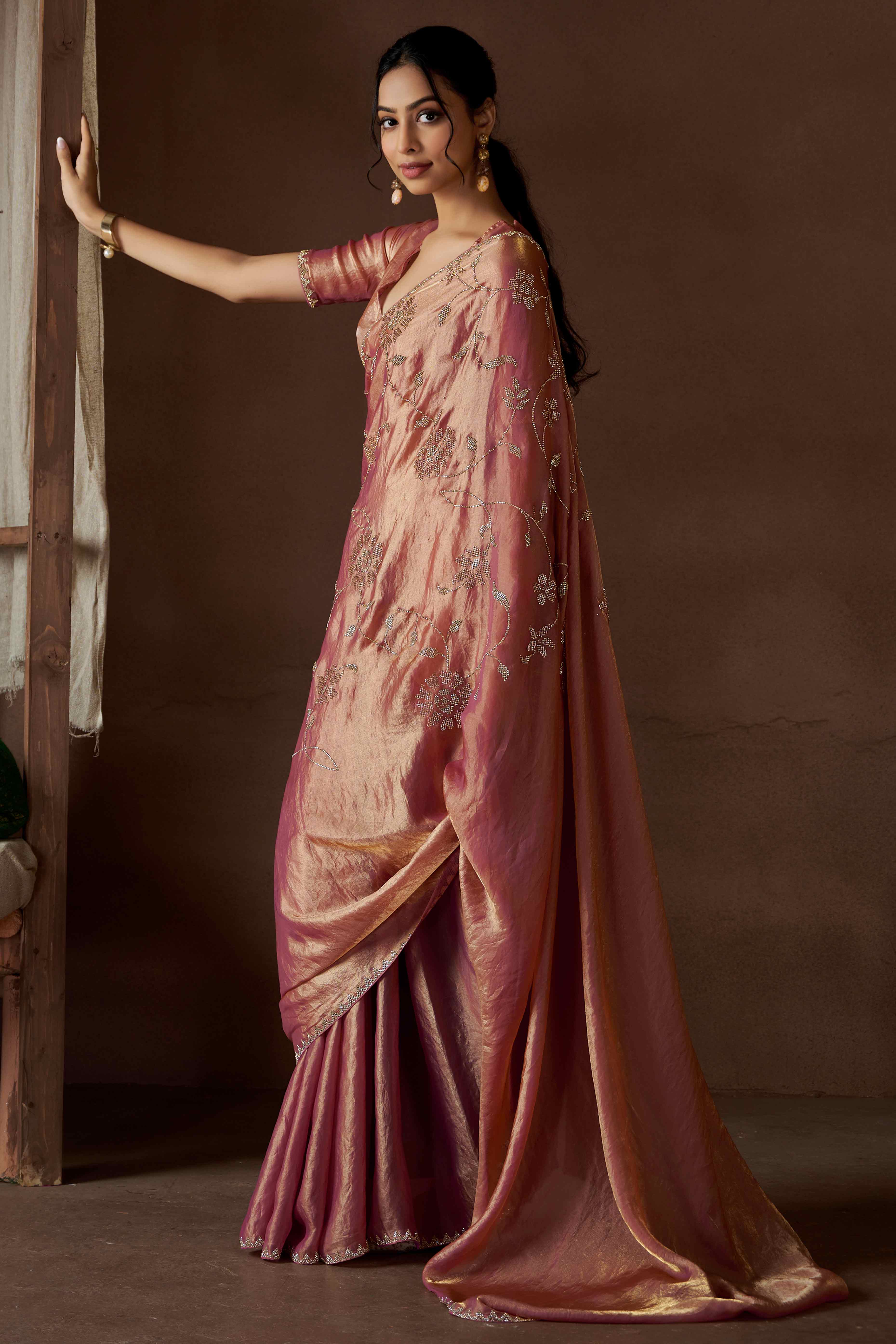 Peach Satin Saree with Exquisite Stone Embellishments