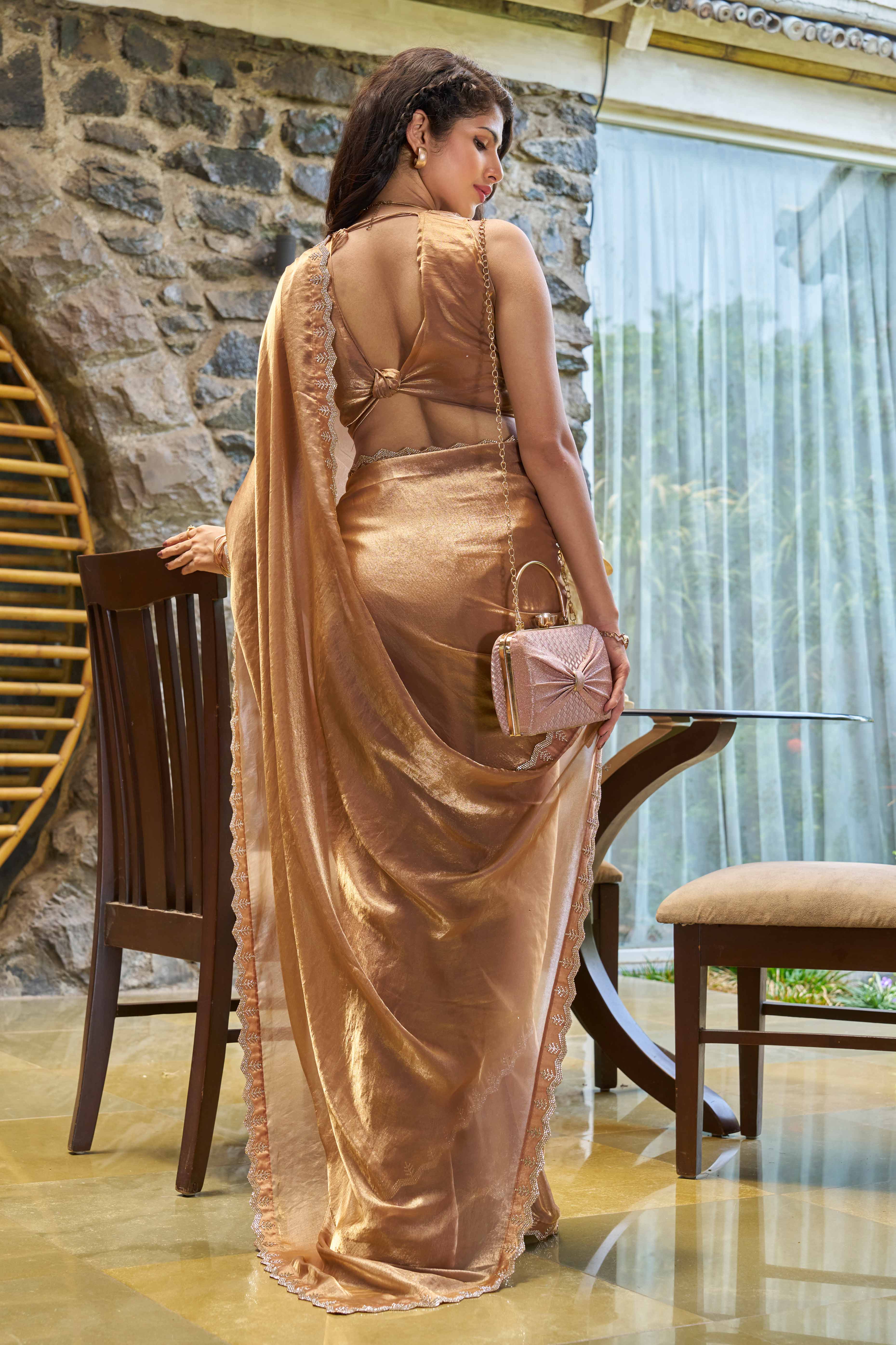 Graceful Emerald  Brown Georgette Solid Saree With Luxurious Handwork