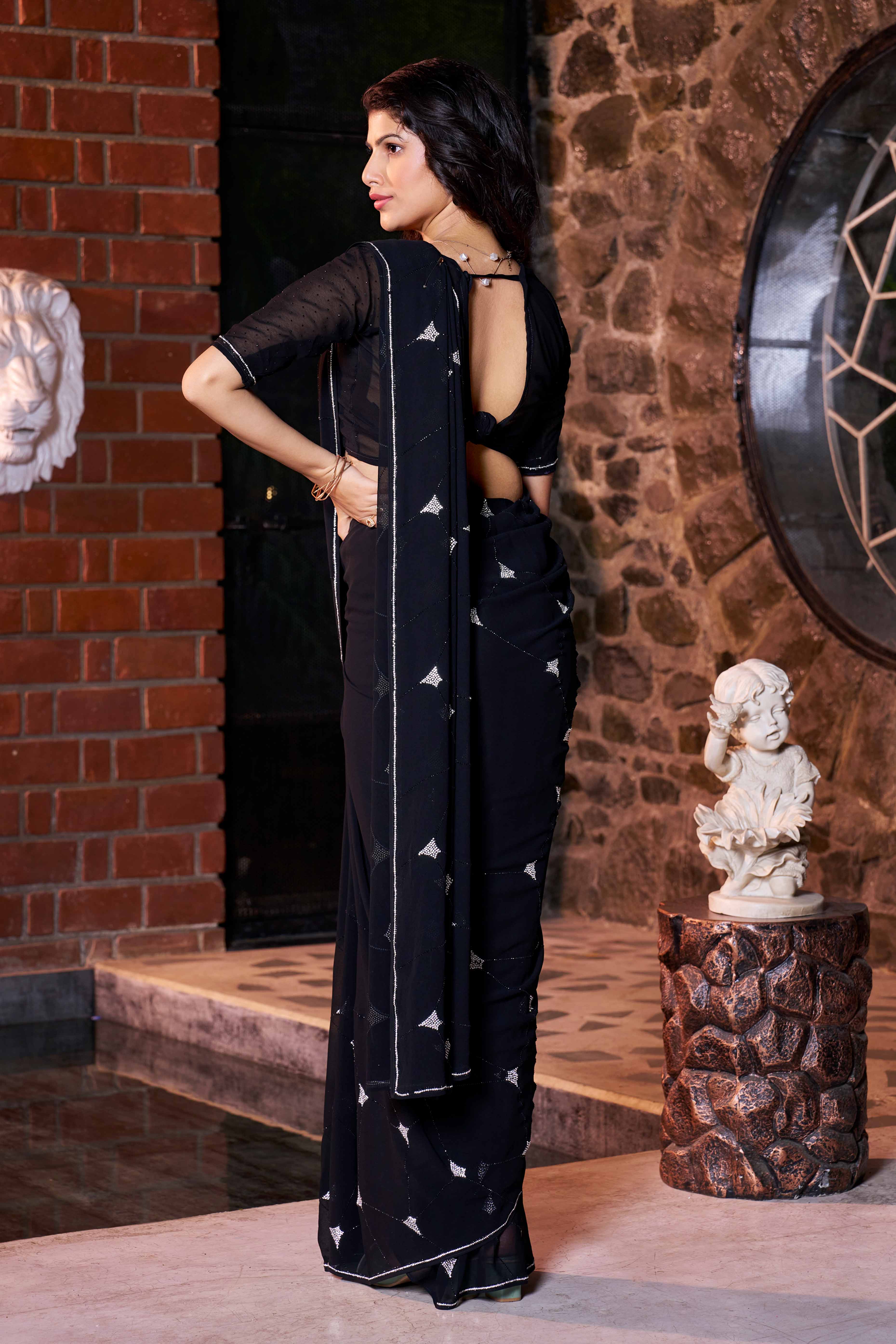 Elegant Black Georgette Saree Embellished With Zarkan Handwork