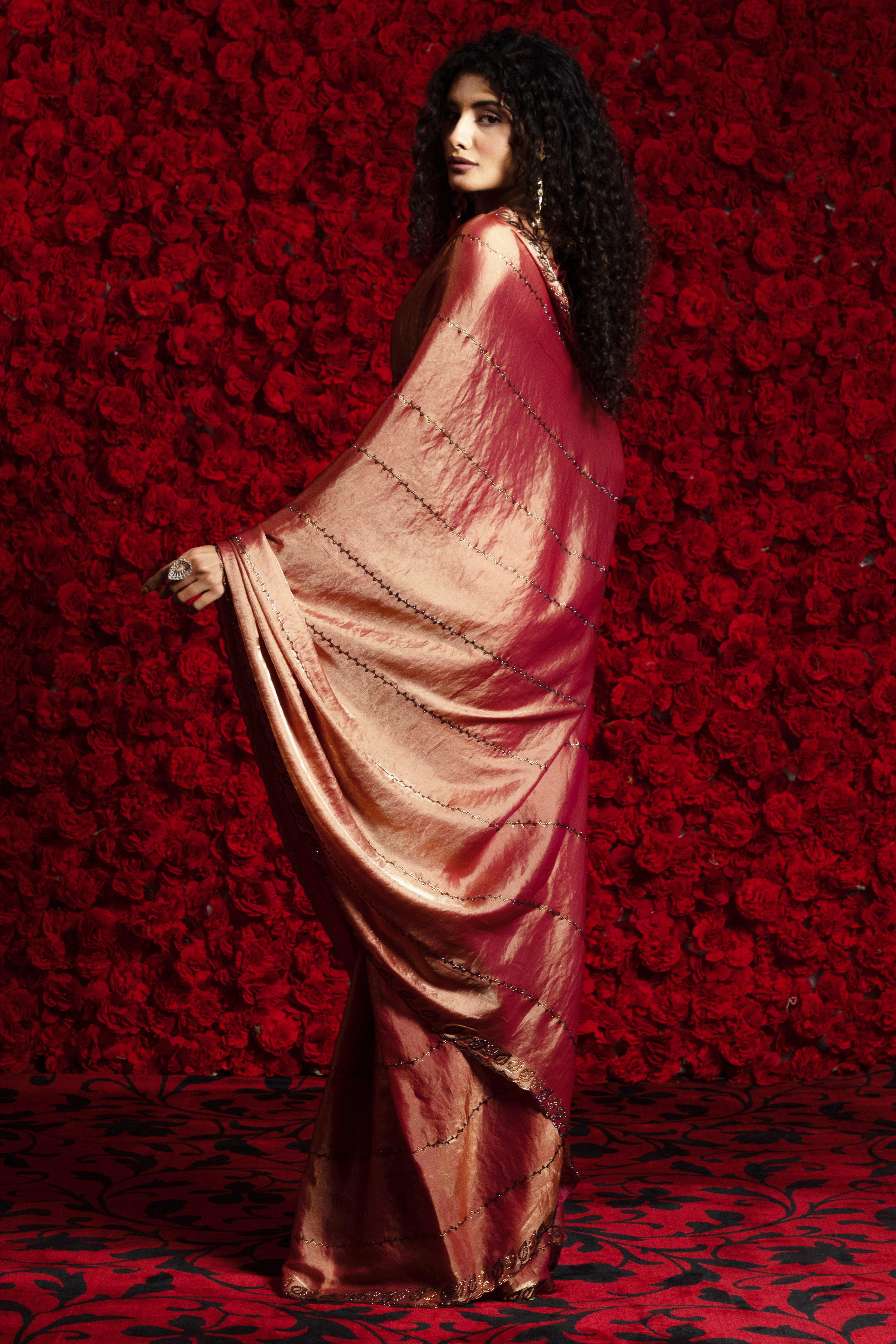 Brick Red Satin Silk Saree with Dazzling Stone Embellishments for Special Occasions