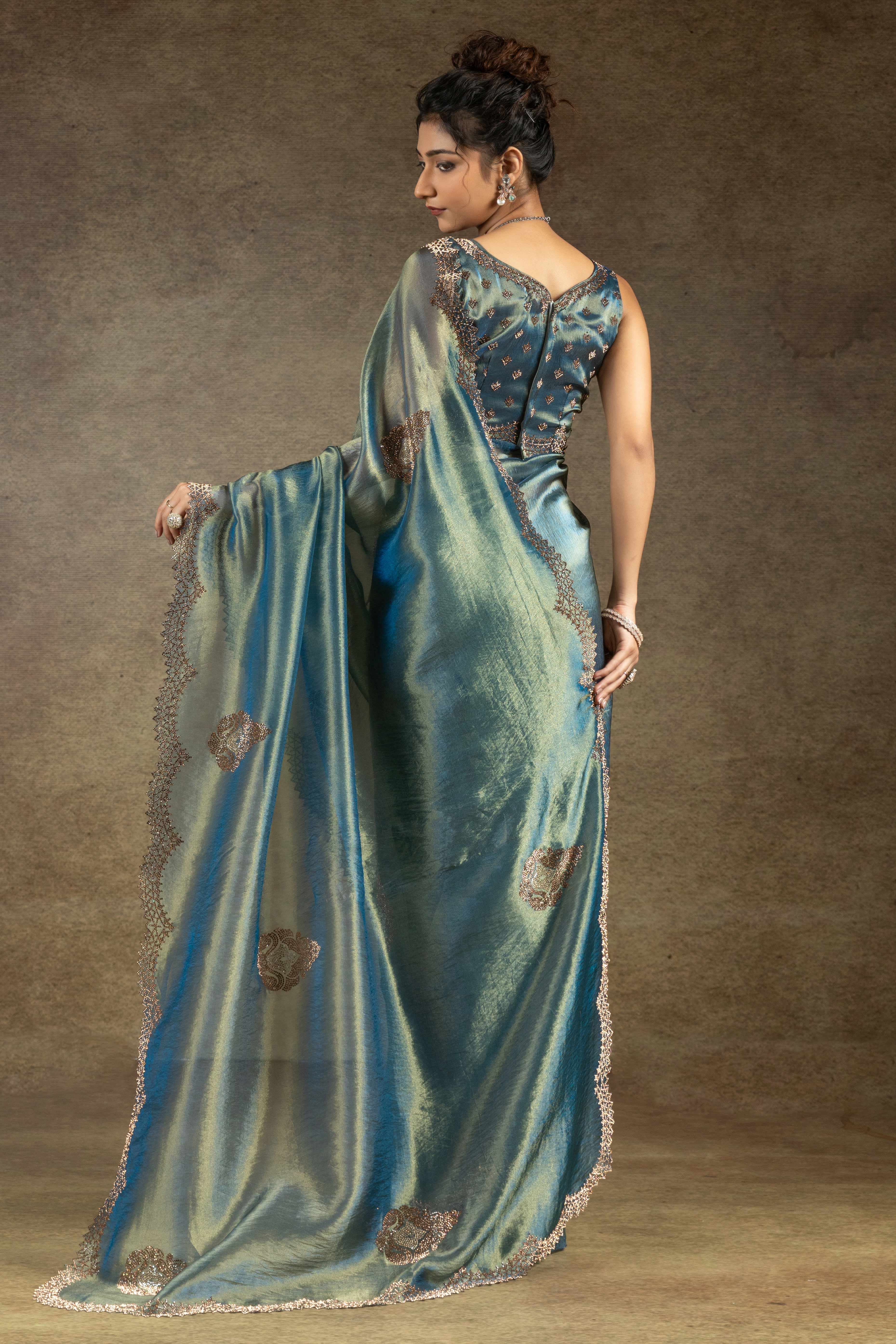 Teal Banarasi Silk Saree with Stone Embellishments Perfect for Party Wear