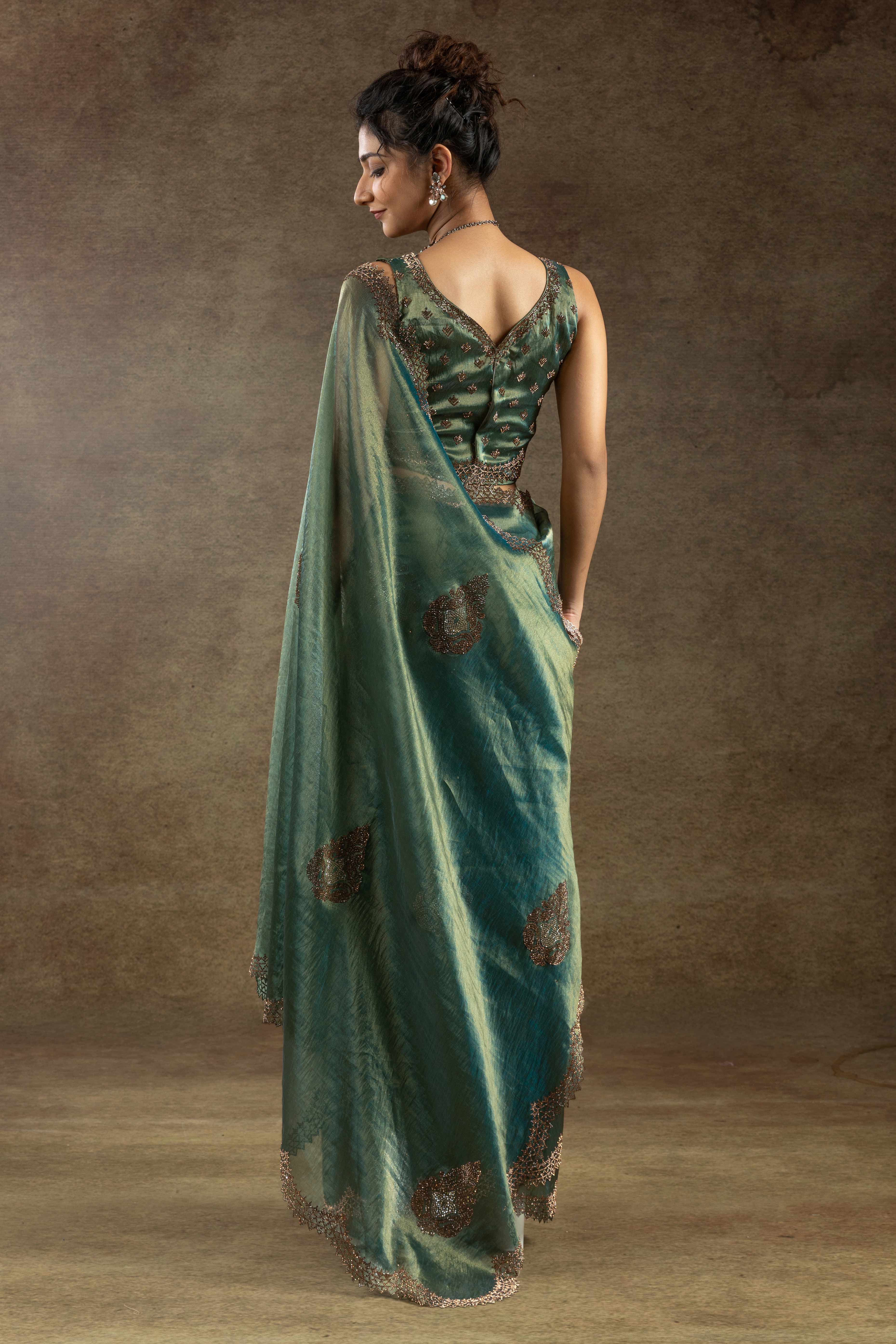 Green Banarasi Silk Saree with Stone Embellishments Perfect for Party Wear