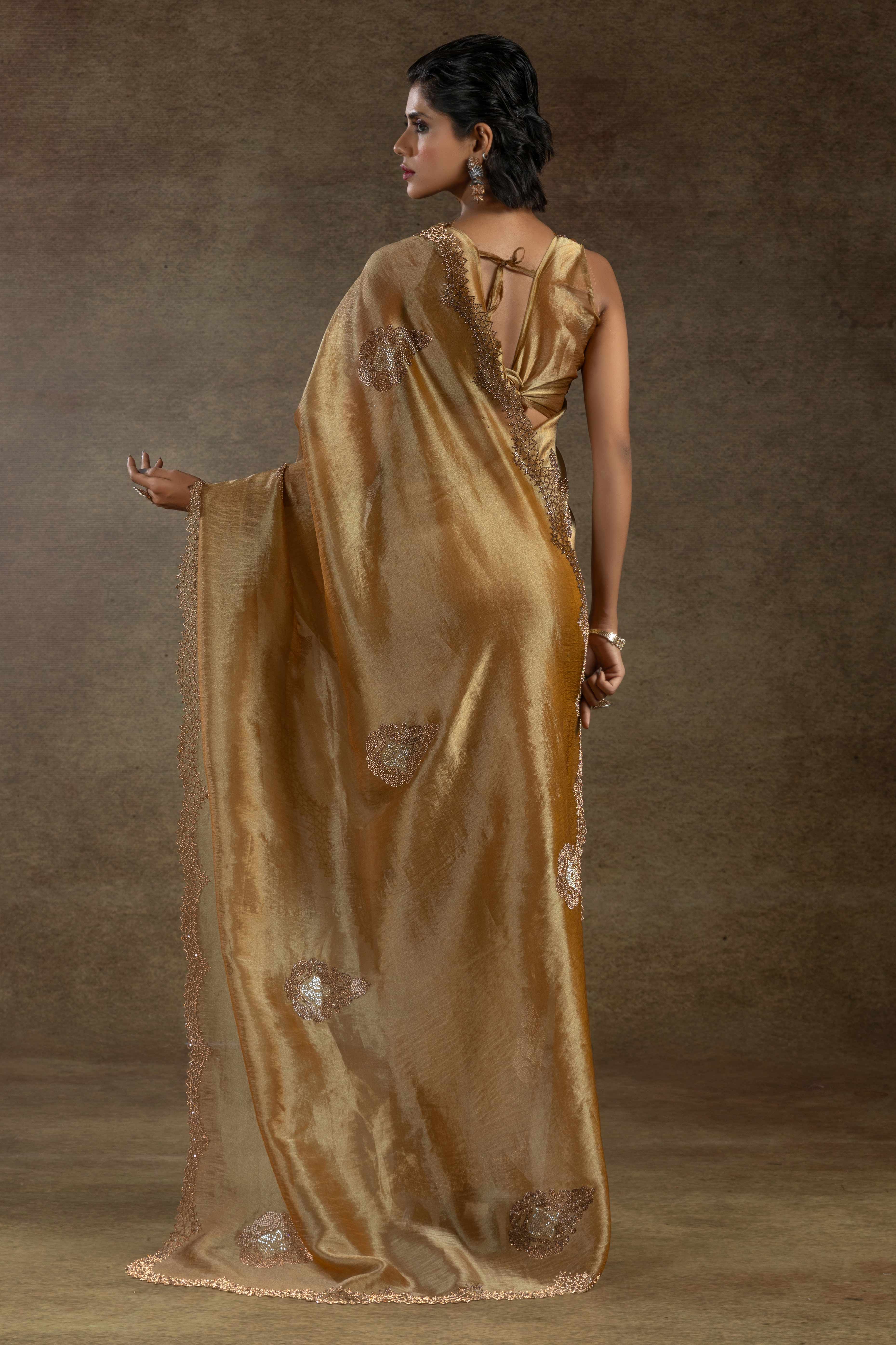 Gold Banarasi Silk Saree with Stone Embellishments Perfect for Party Wear