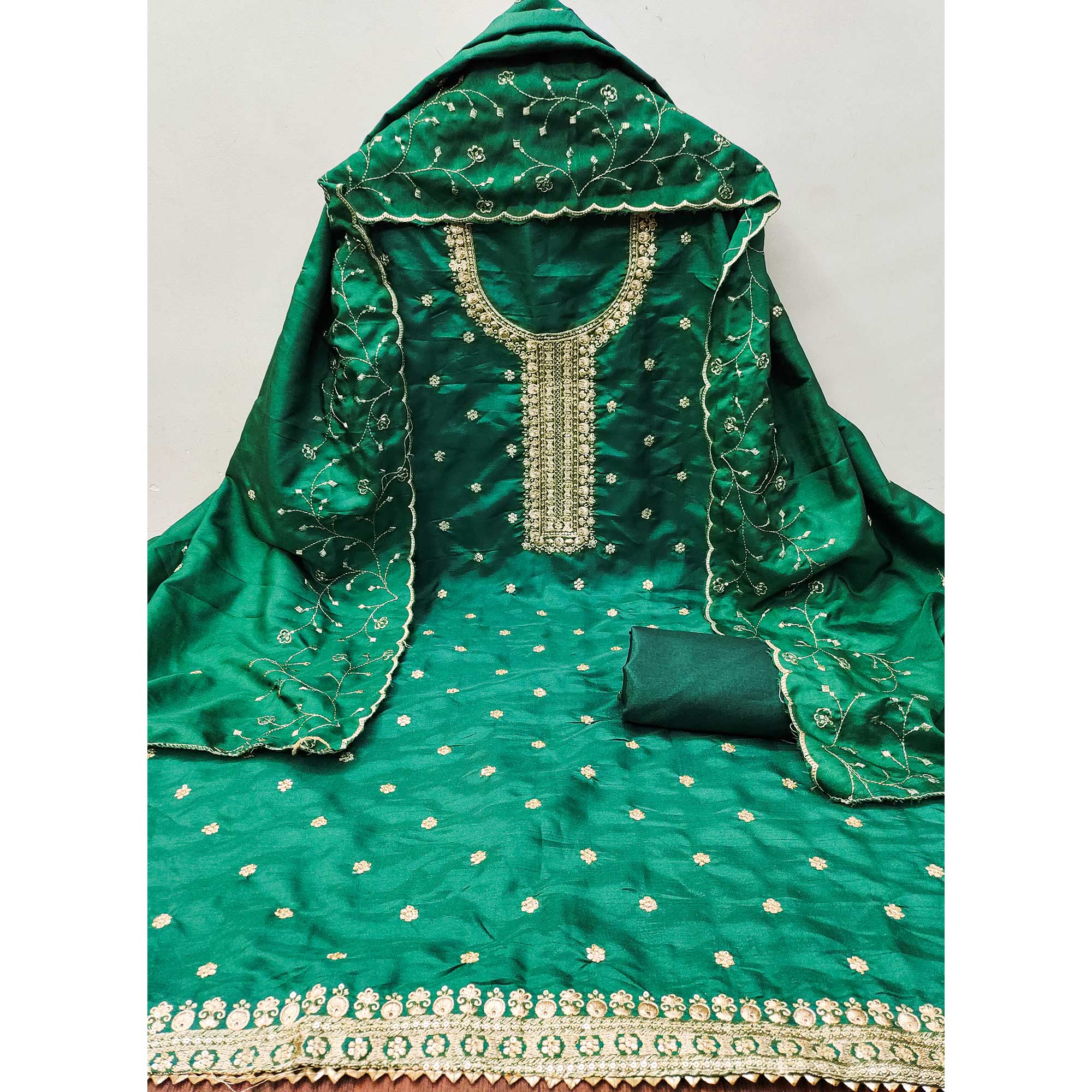 Green Cotton Silk Unstitched Dress Material Featuring Delicate Jalpari Embroidery