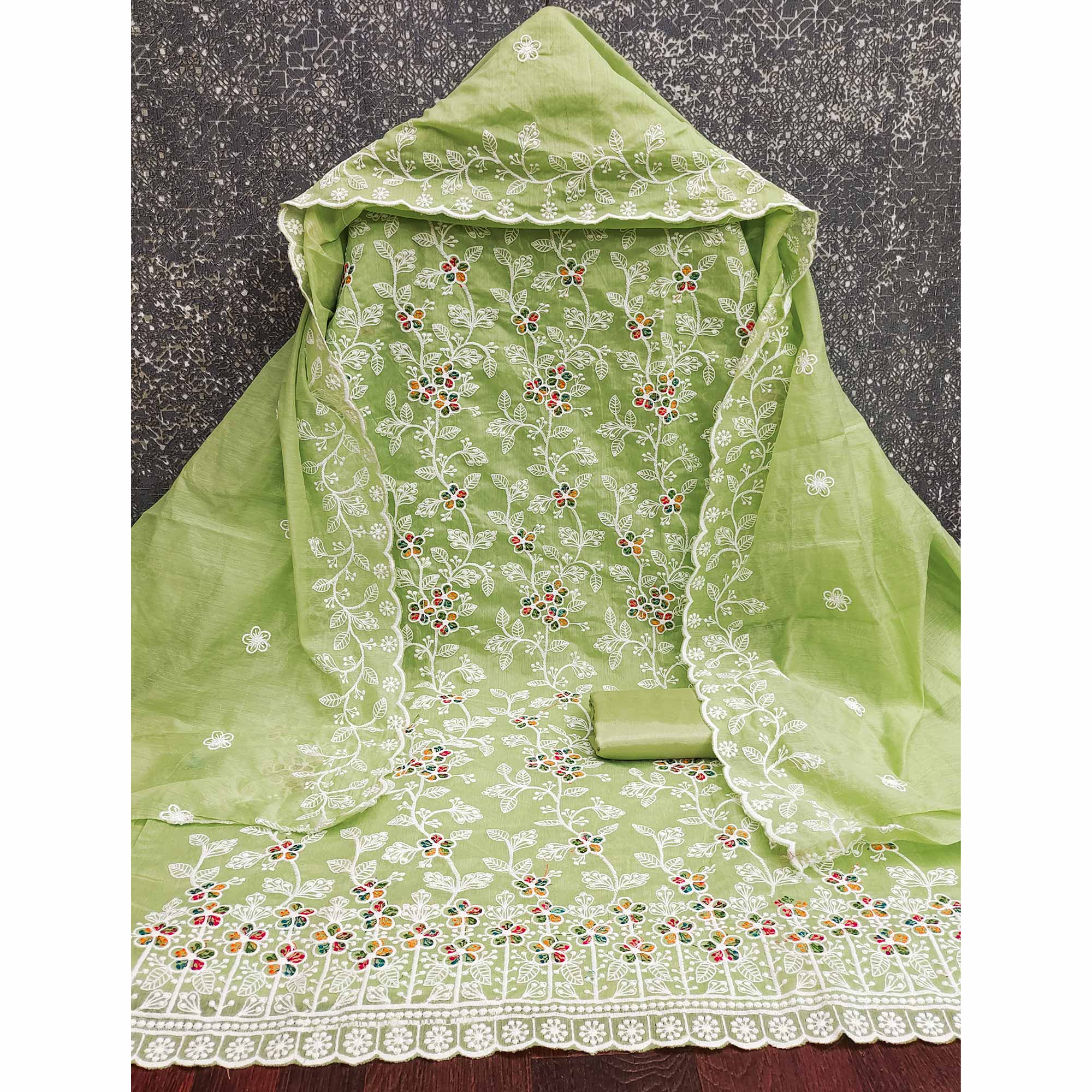 Light Green Chanderi Cotton Dress Material Adorned With Elegant Floral Thread Embroidery Work