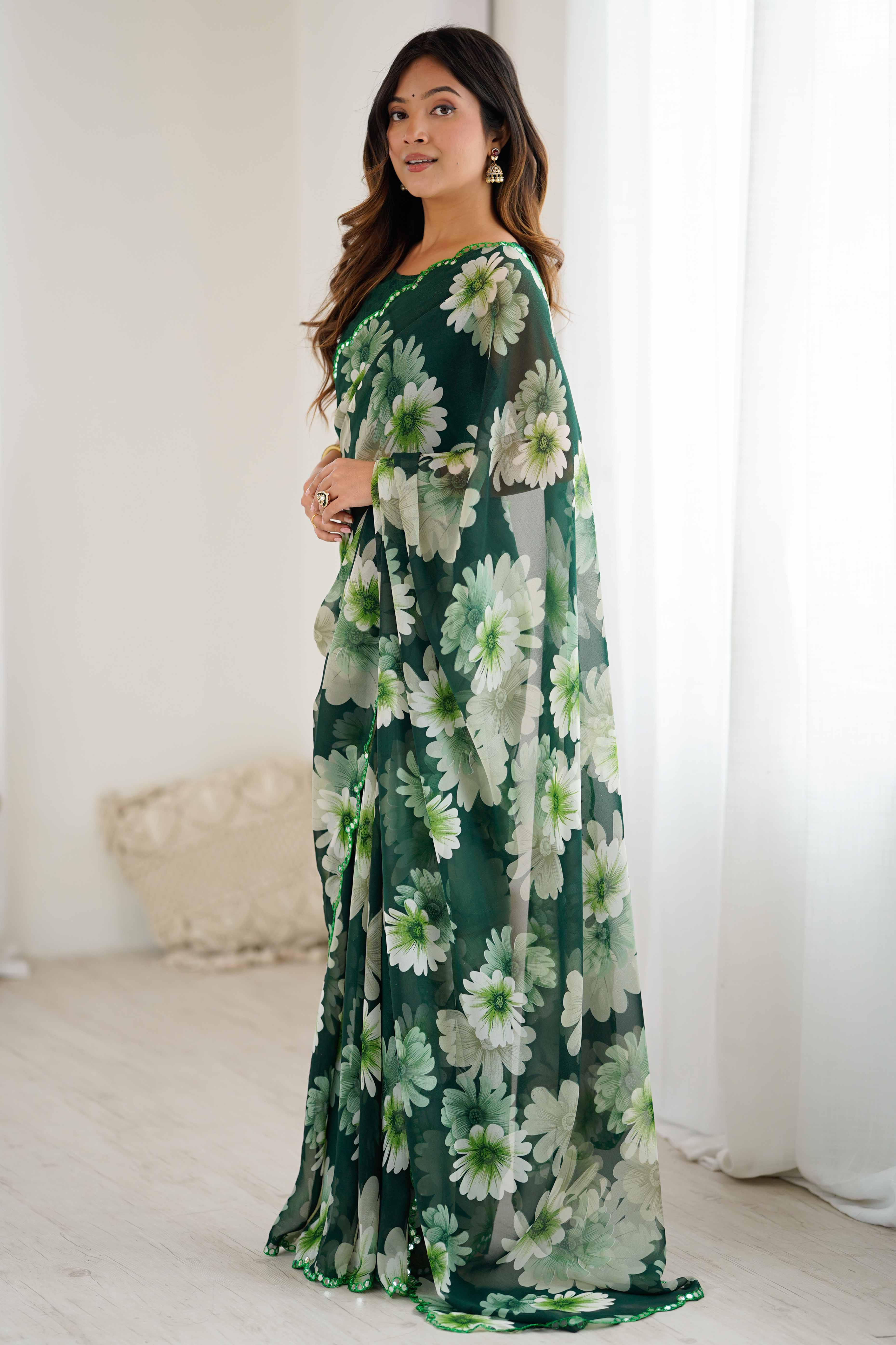 Green Georgette Saree Featuring Floral Prints & Shimmering Mirror Work Border