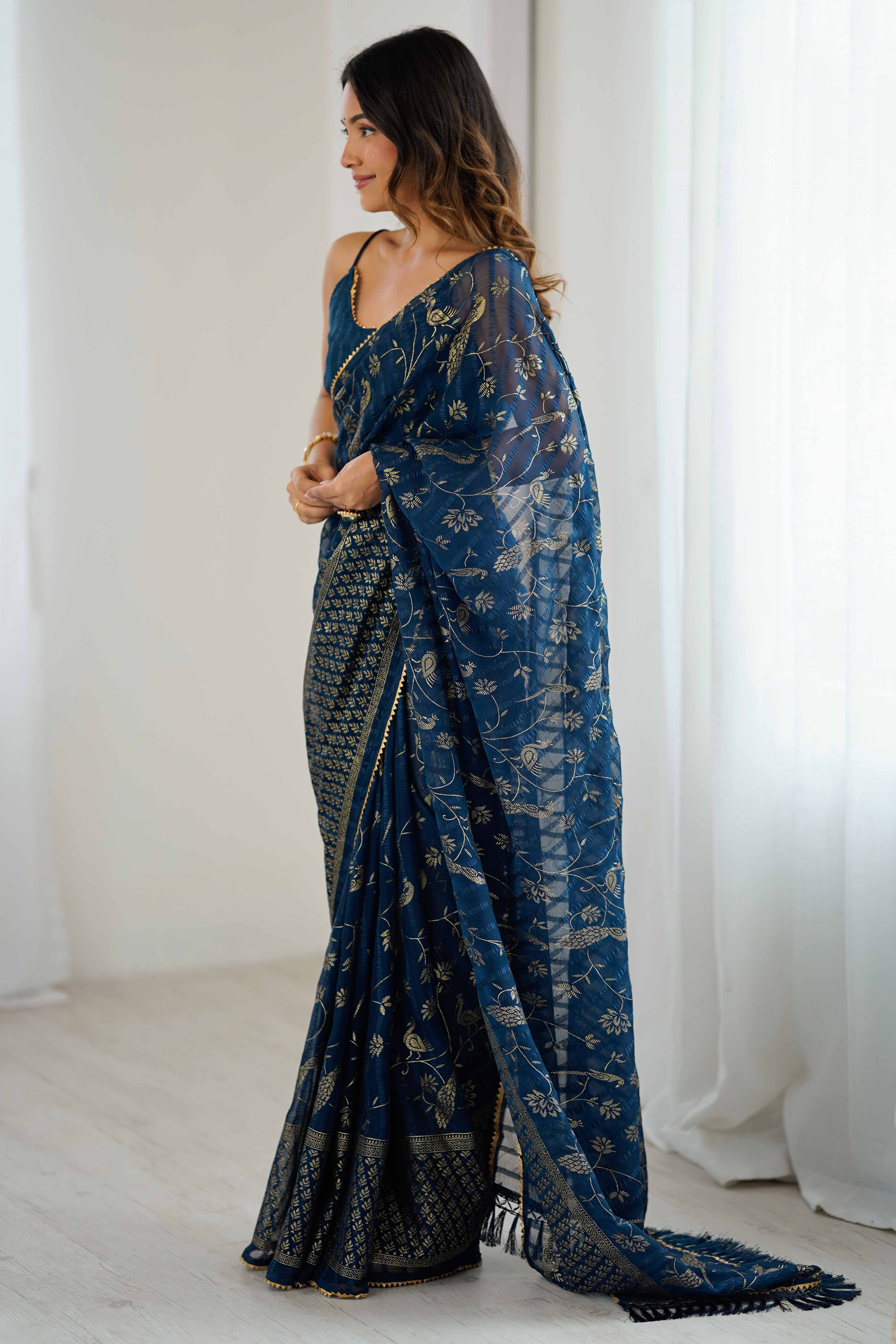 Morpich Blue Georgette Saree with Shimmering Foil Print & Gota Patti Border