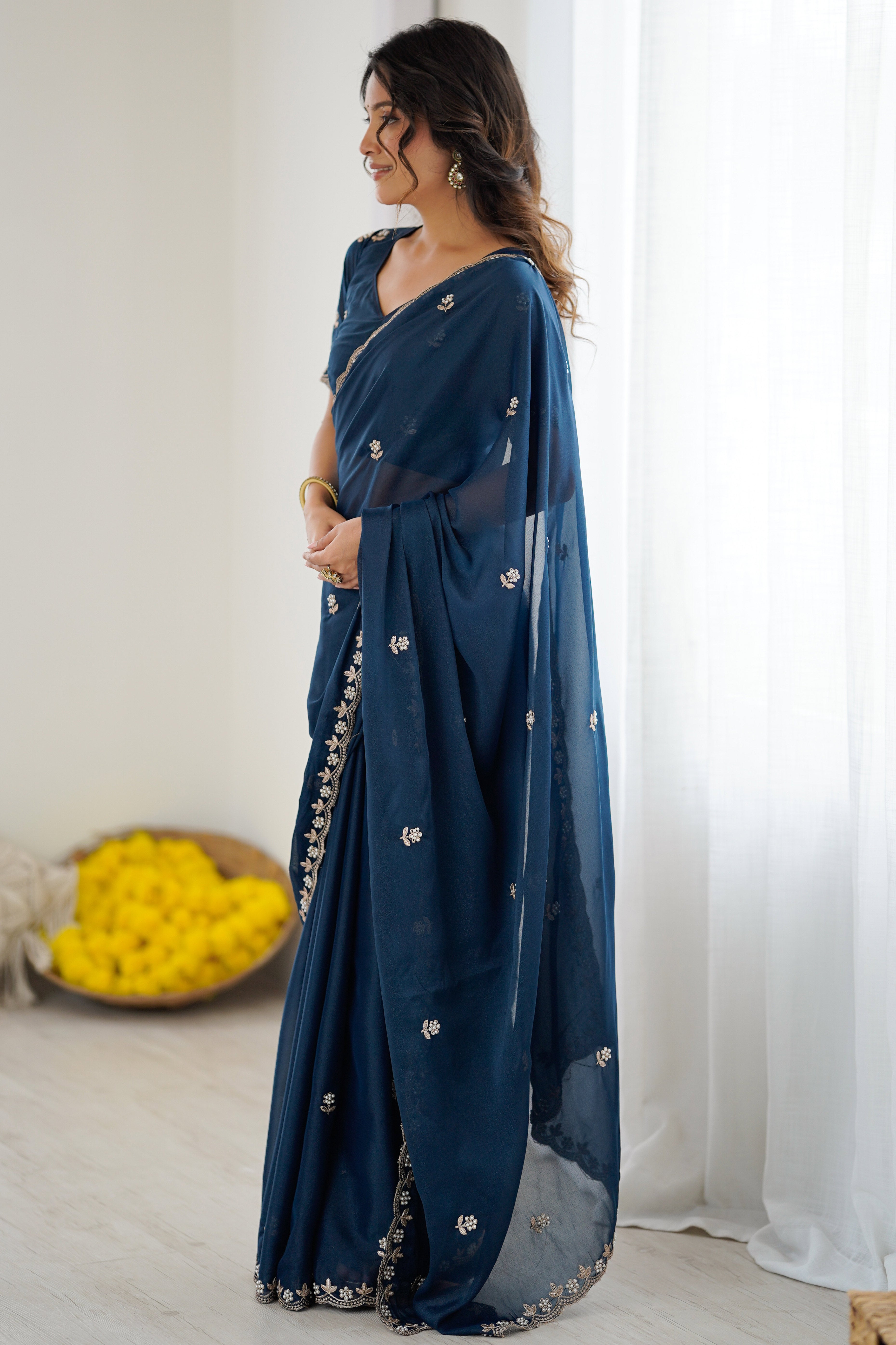 Blue Partywear Star Georgette Saree Adorned with Floral Embroidery and Beads Work