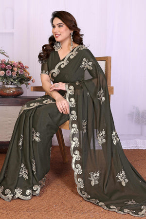 Charming Mehendi Green Floral & Peacock Motif Georgette Saree Enhanced With Sequins Embroidery