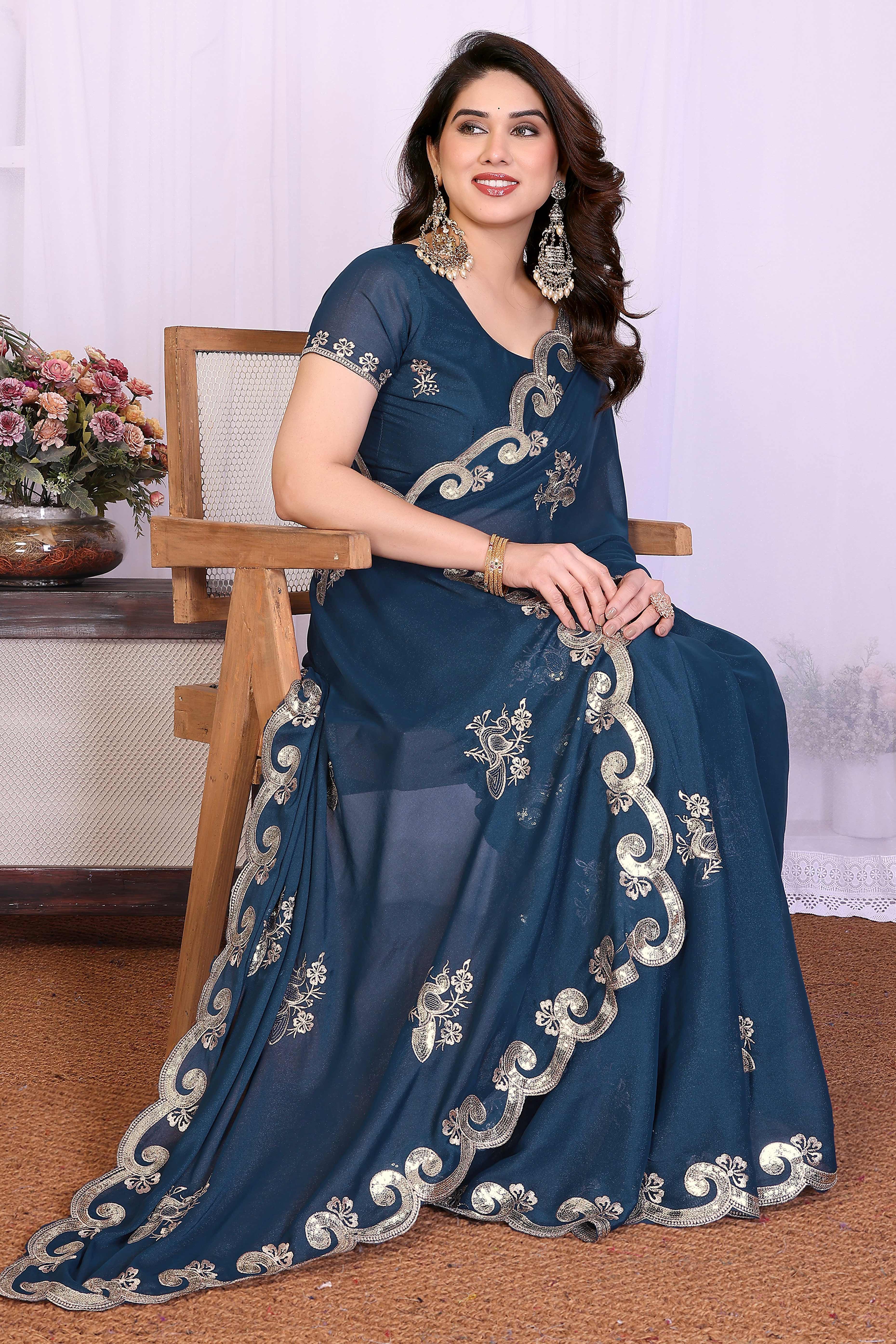 Charming Morpich Blue Floral & Peacock Motif Georgette Saree Enhanced With Sequins Embroidery
