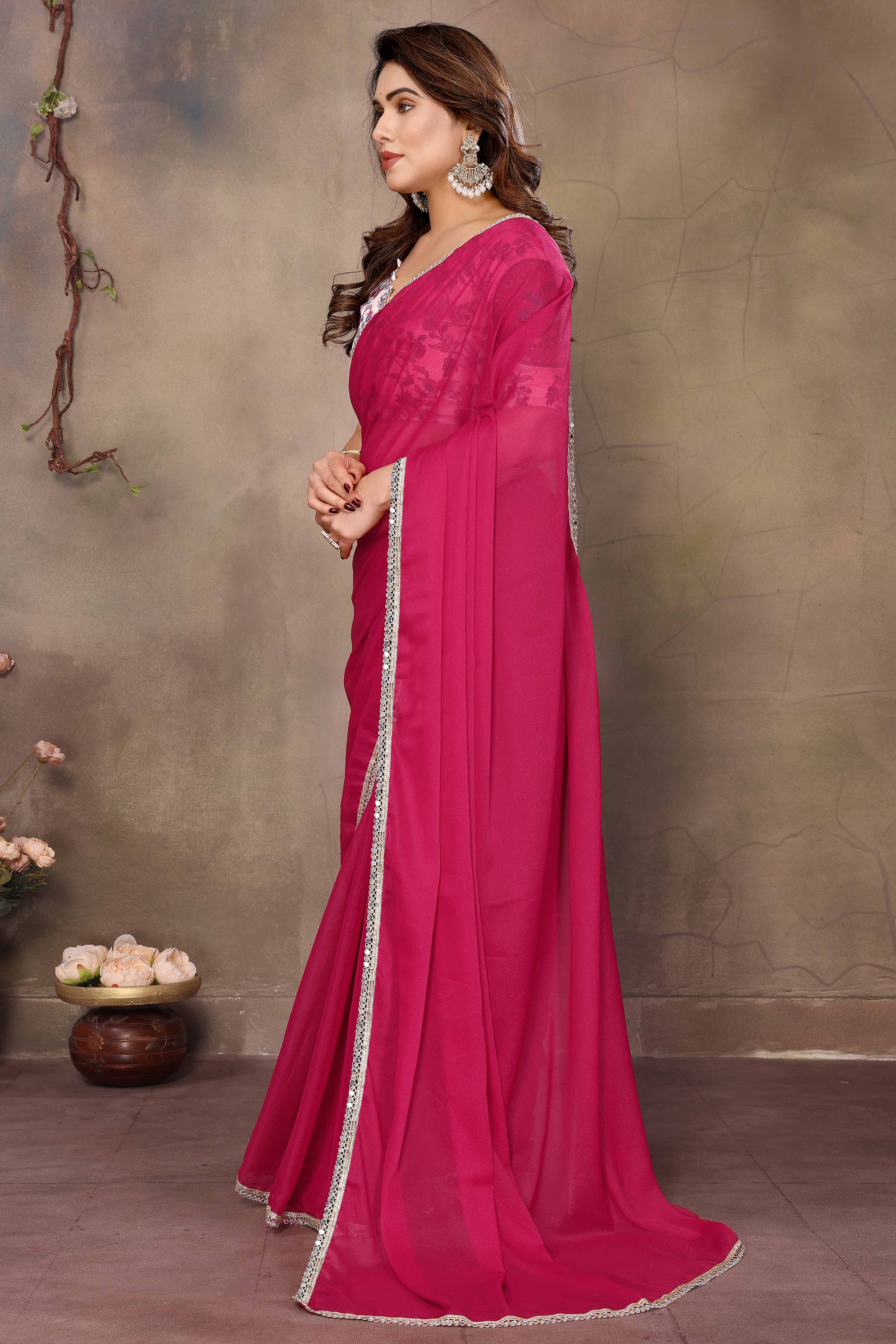 Pink Solid Sparkling Georgette Saree Enhanced With Shimmering Mirror Border