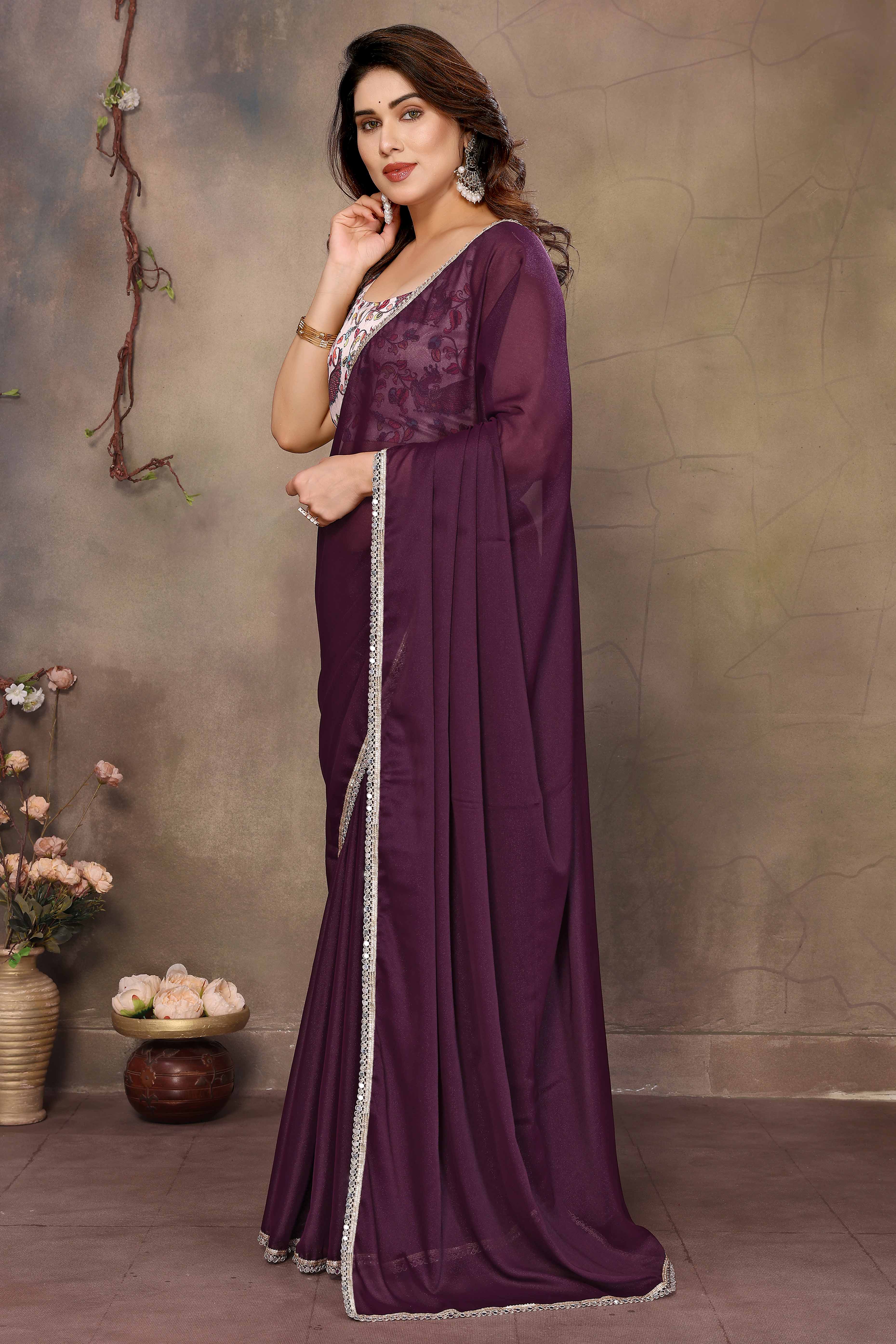 Wine Solid Sparkling Georgette Saree Enhanced With Shimmering Mirror Border