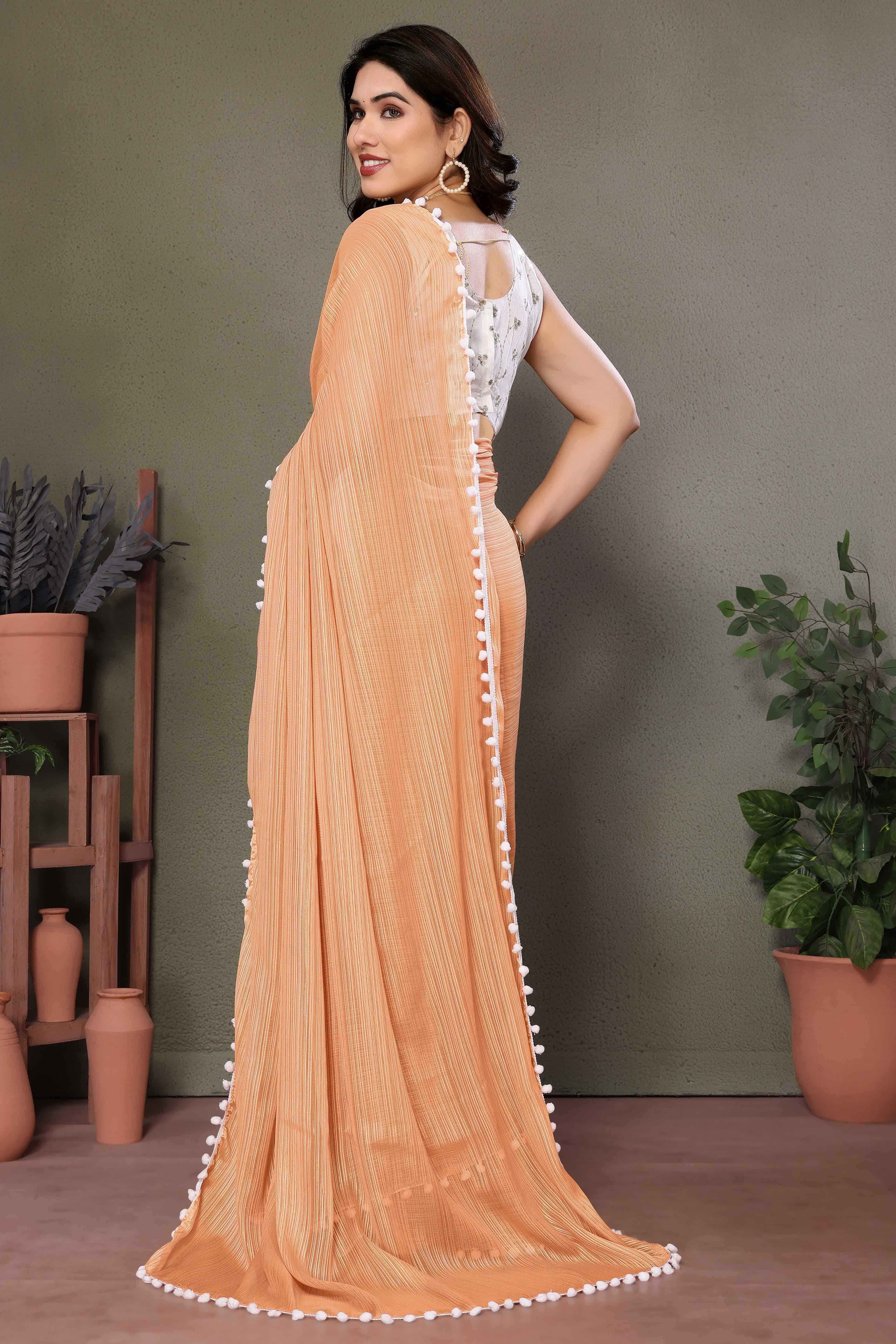 Light Orange Zari Woven Satin Saree With Pompom Border