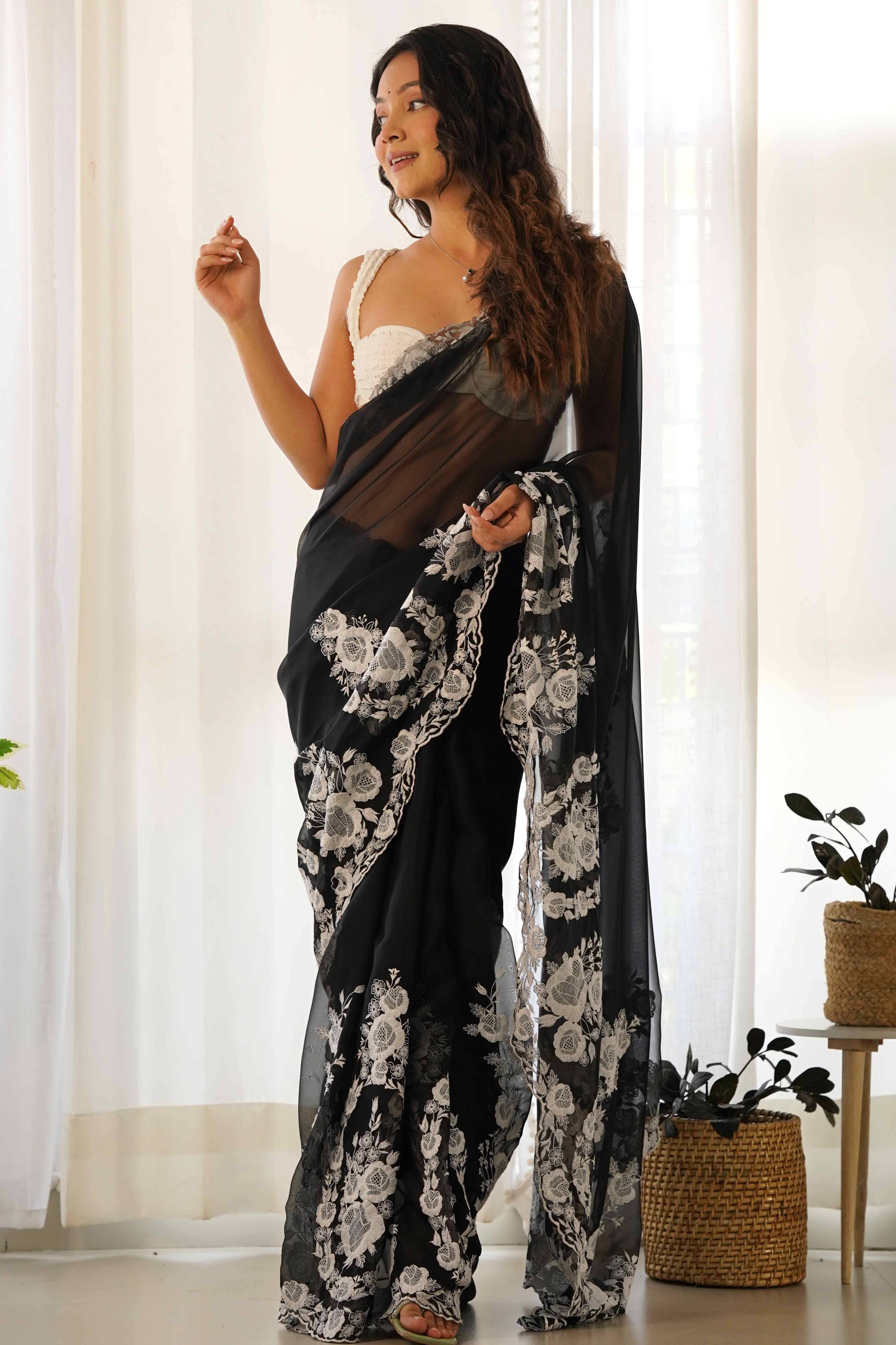 Black Embroidered Georgette Saree Featuring Ornate Heavy Thread Work