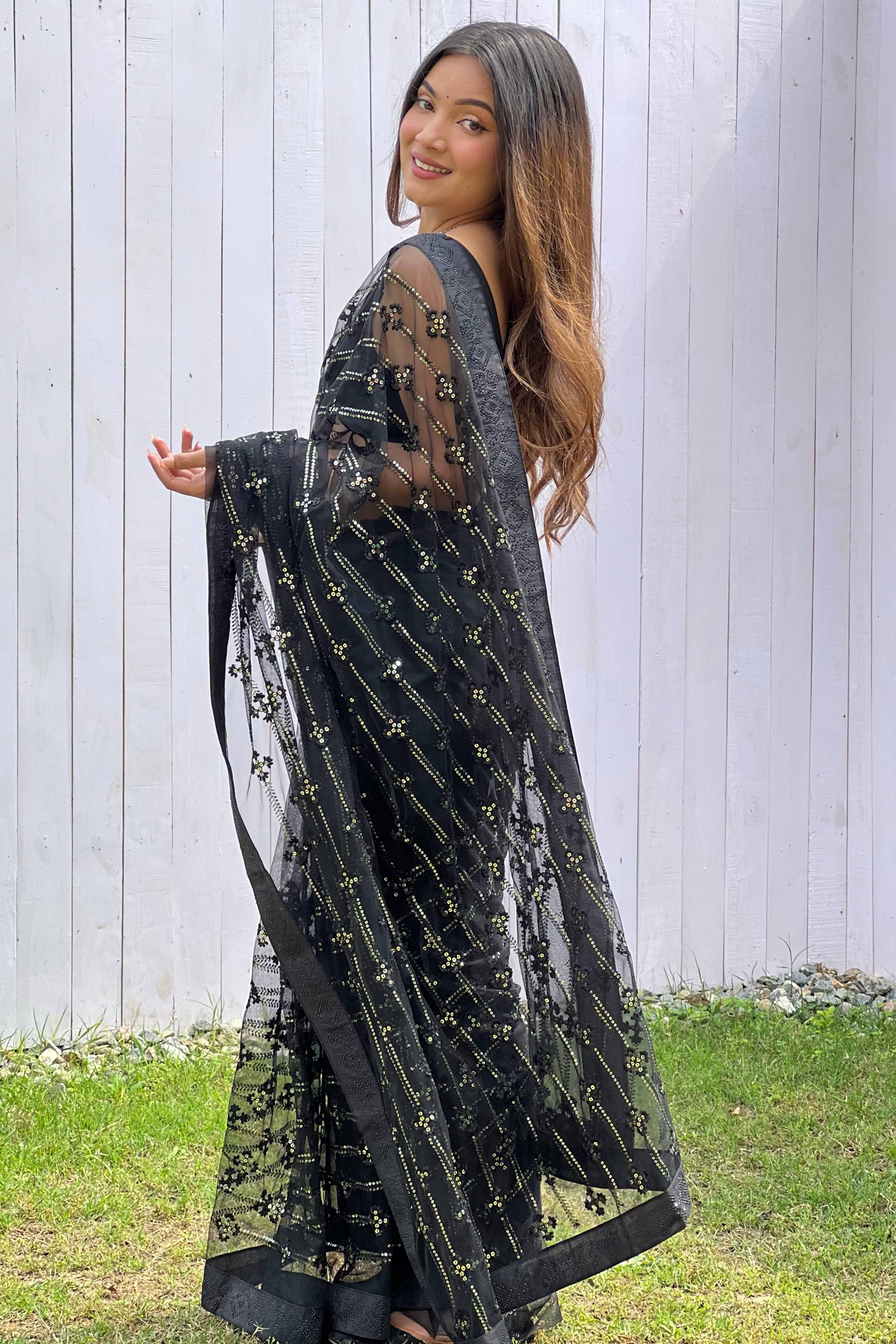 Black Net Saree Featuring Intricate Thread & Sequins Work With A Luxe Diamond Border