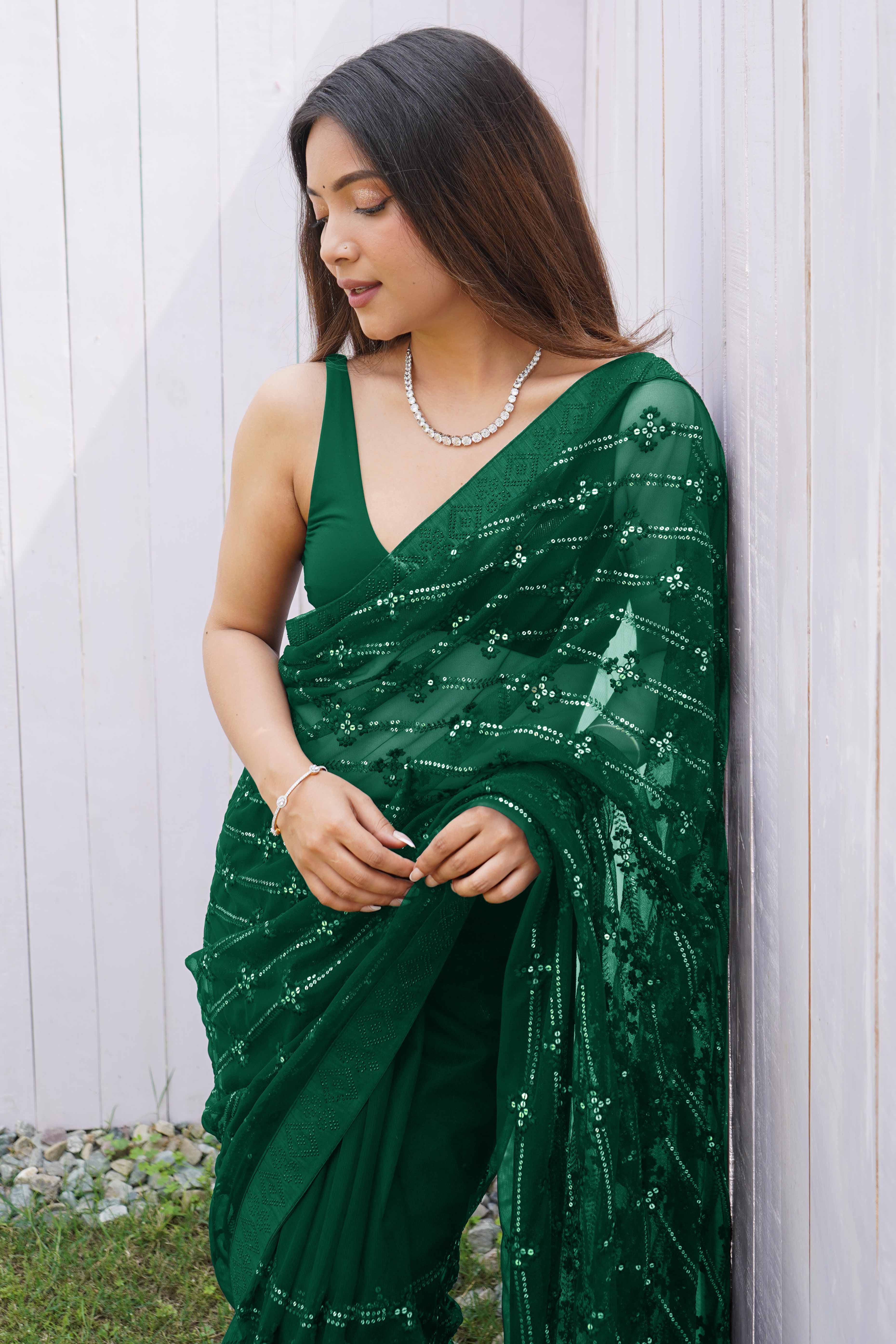 Bottle Green Net Saree Featuring Intricate Thread & Sequins Work With A Luxe Diamond Border