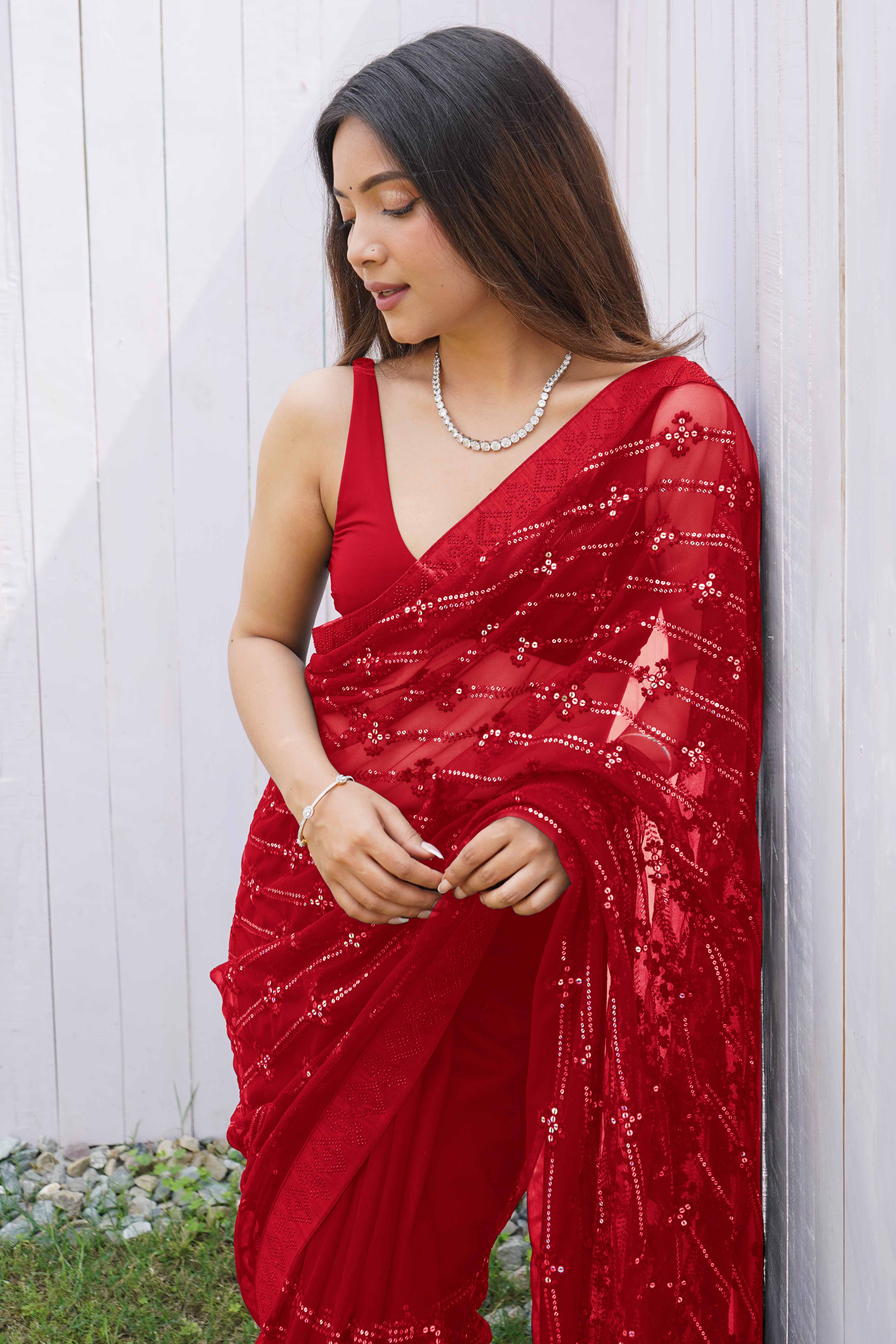 Red Net Saree Featuring Intricate Thread & Sequins Work With A Luxe Diamond Border