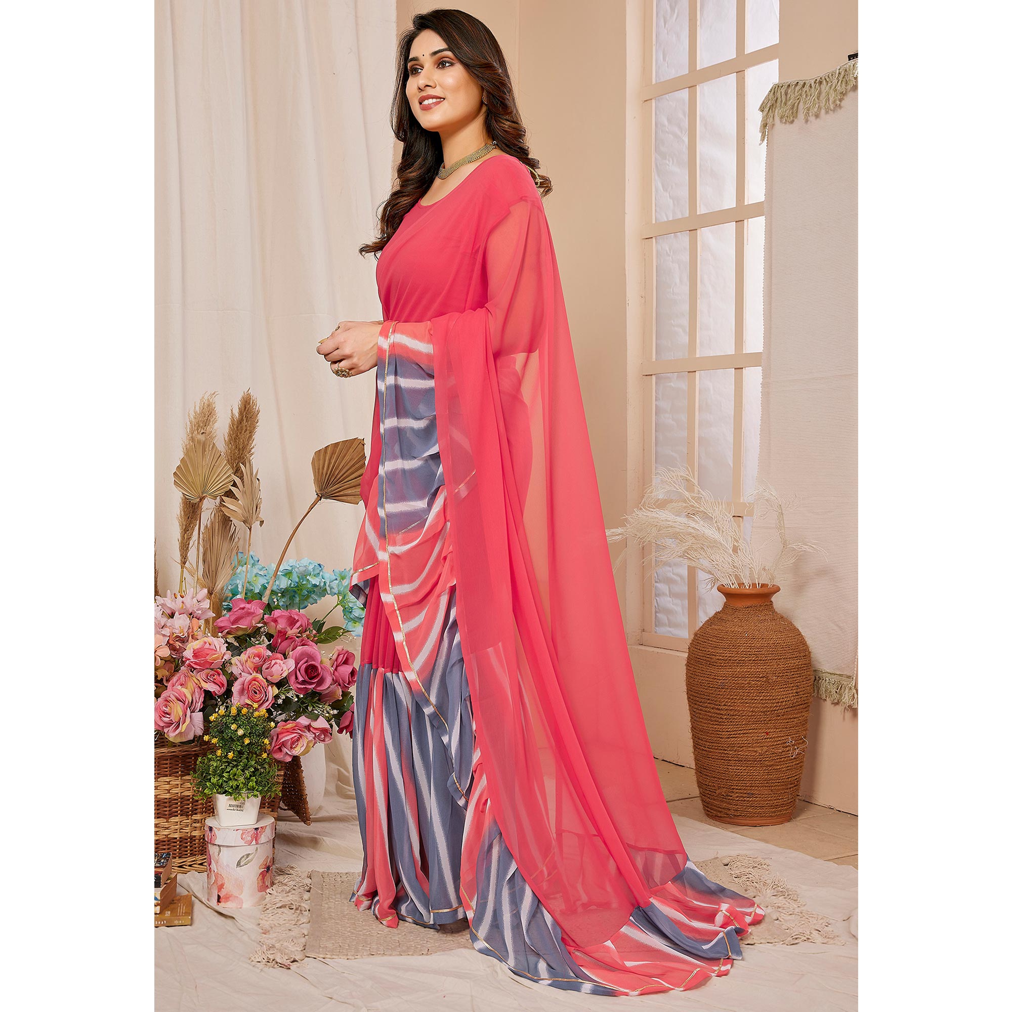 Pink Solid Georgette Saree With Printed Ruffle Border