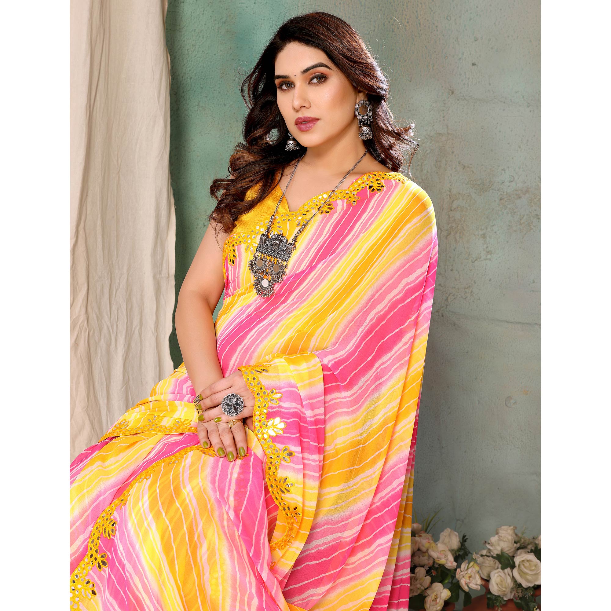 Yellow & Pink Printed Georgette Saree With Mirror Work Border