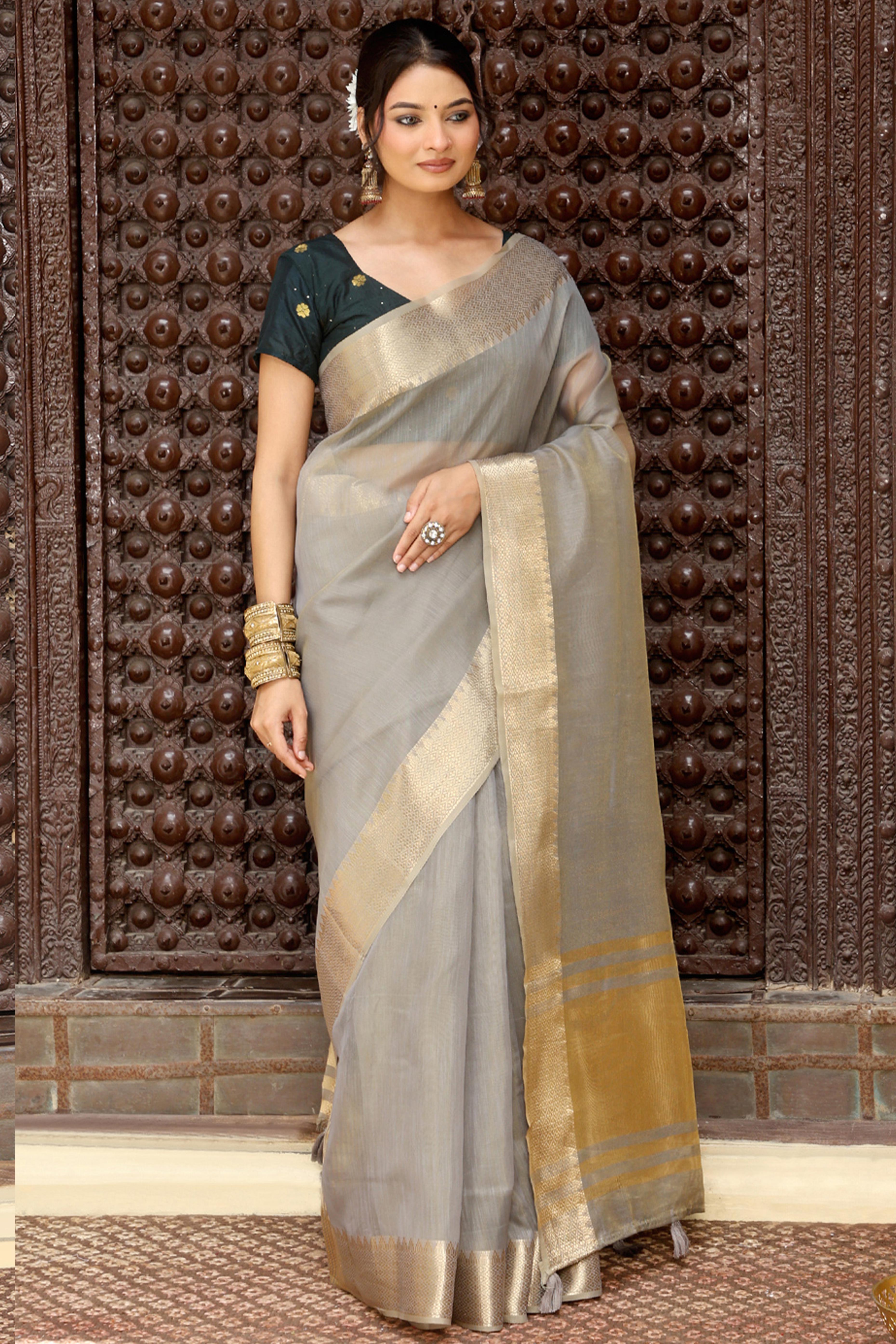 Trendy Grey Cotton Blend Saree Showcasing Elegant Zari Weaving & Tassel Border Pallu