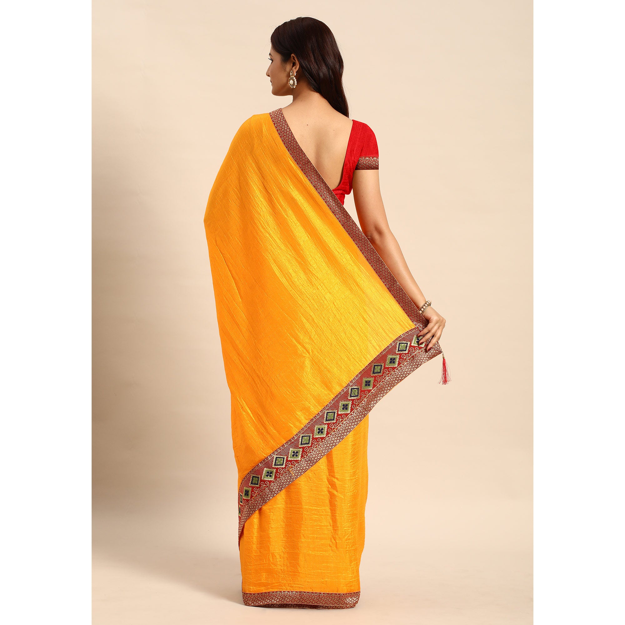 Yellow Solid Vichitra Silk Saree With Fancy Border