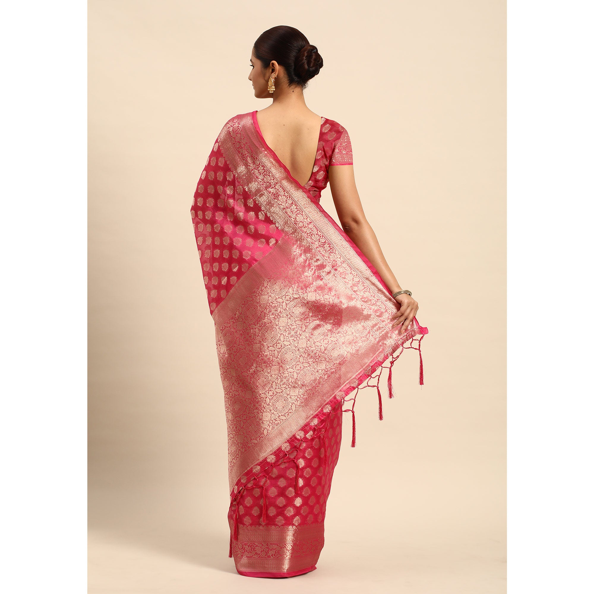 Rani Pink Woven Organza Silk Saree With Tassels
