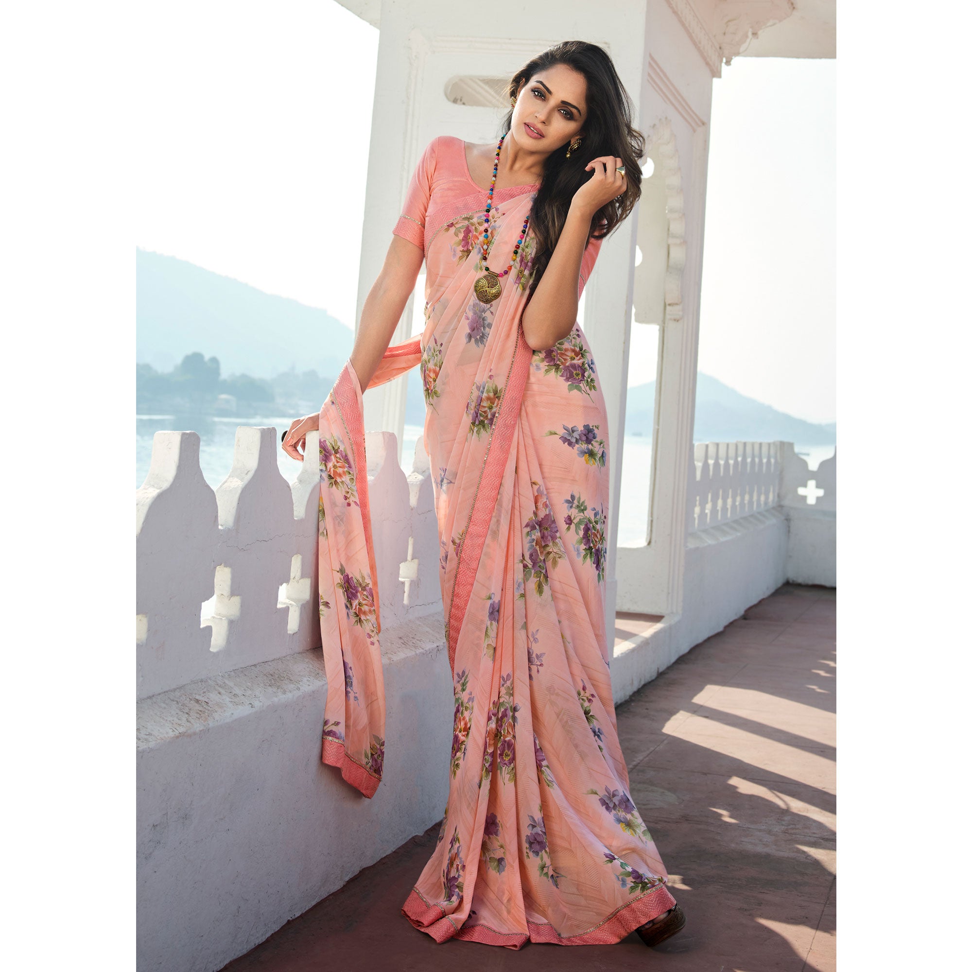 Peach Floral Printed With Embroidered Border Georgette Saree