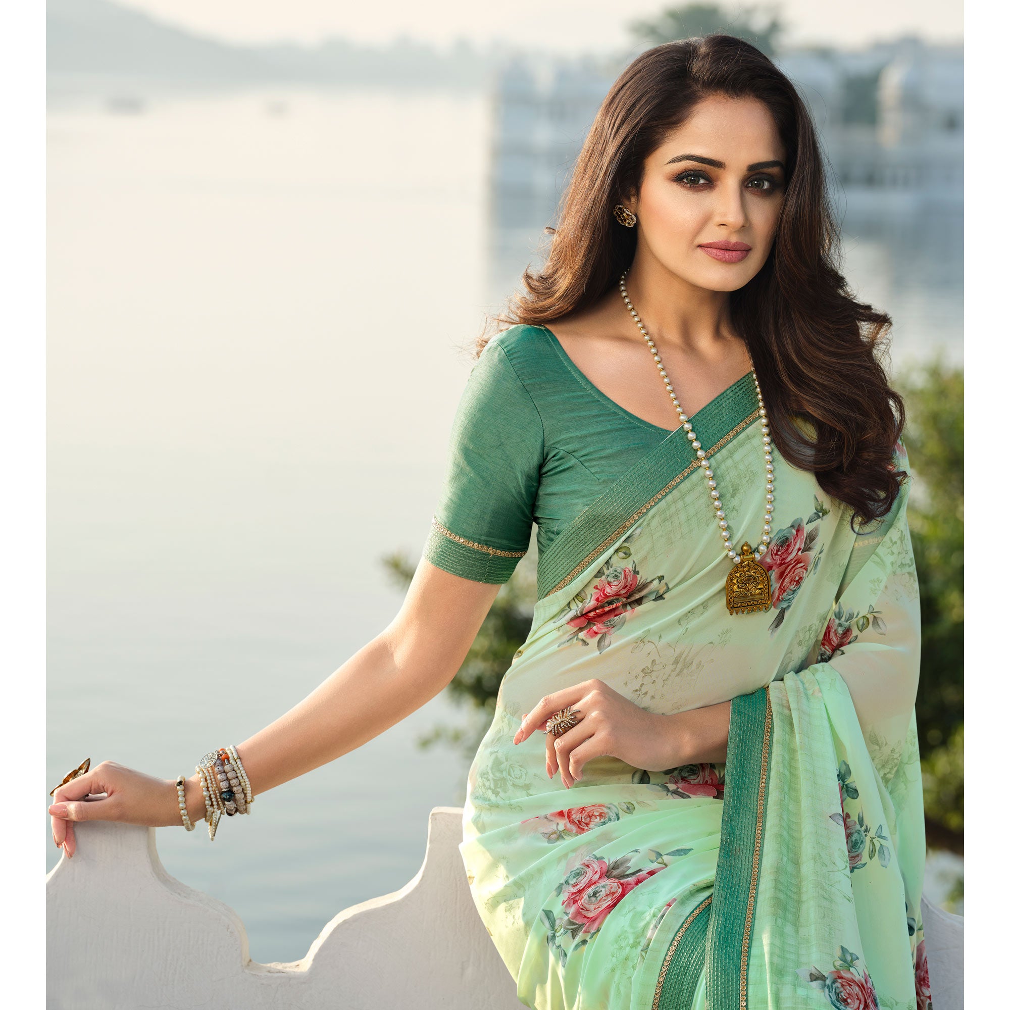 Turquoise Floral Printed With Embroidered Border Georgette Saree