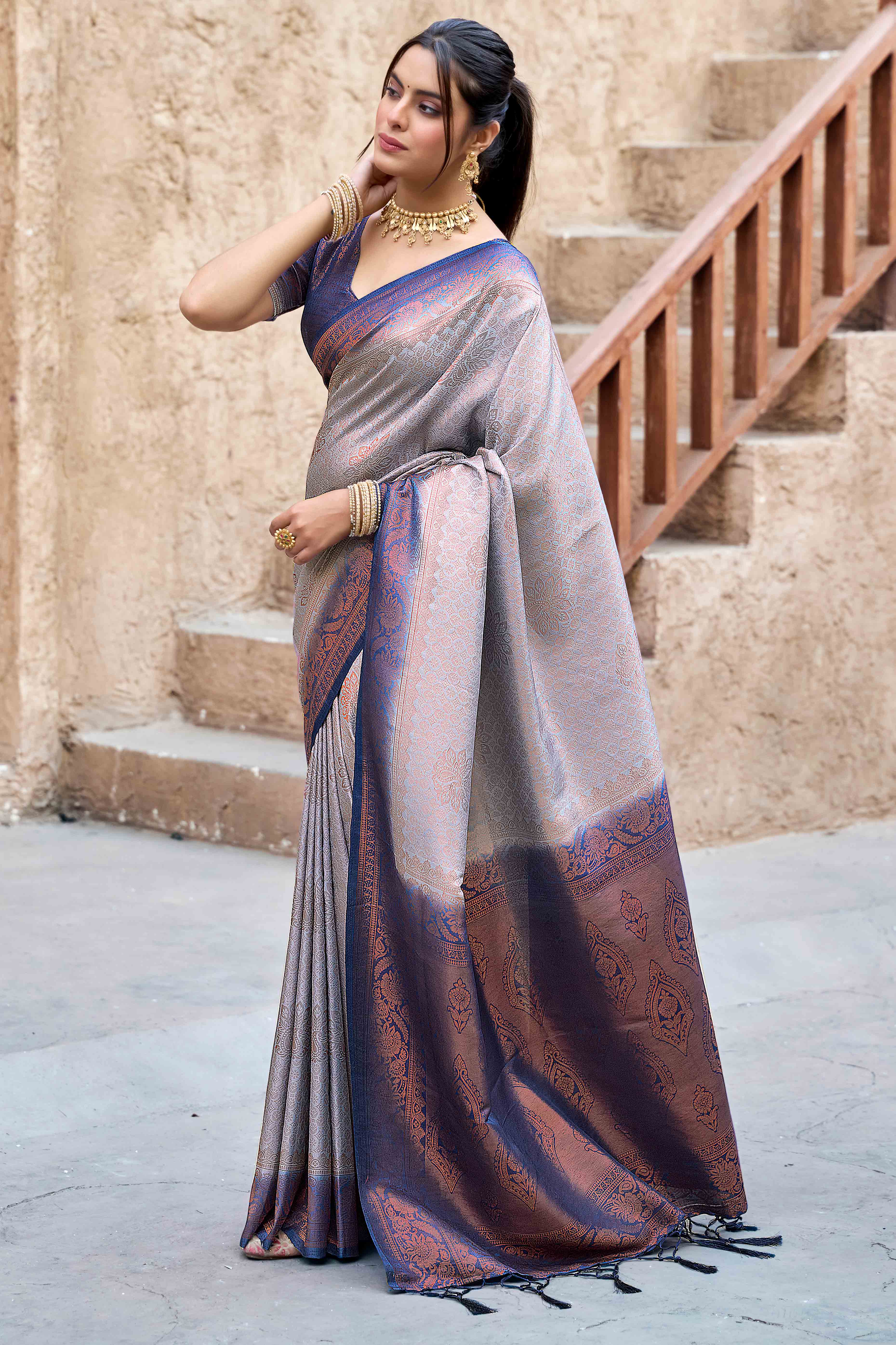 Grey Banarasi Silk Saree Featuring Elegant Floral Woven & Delicate Tassel Edging
