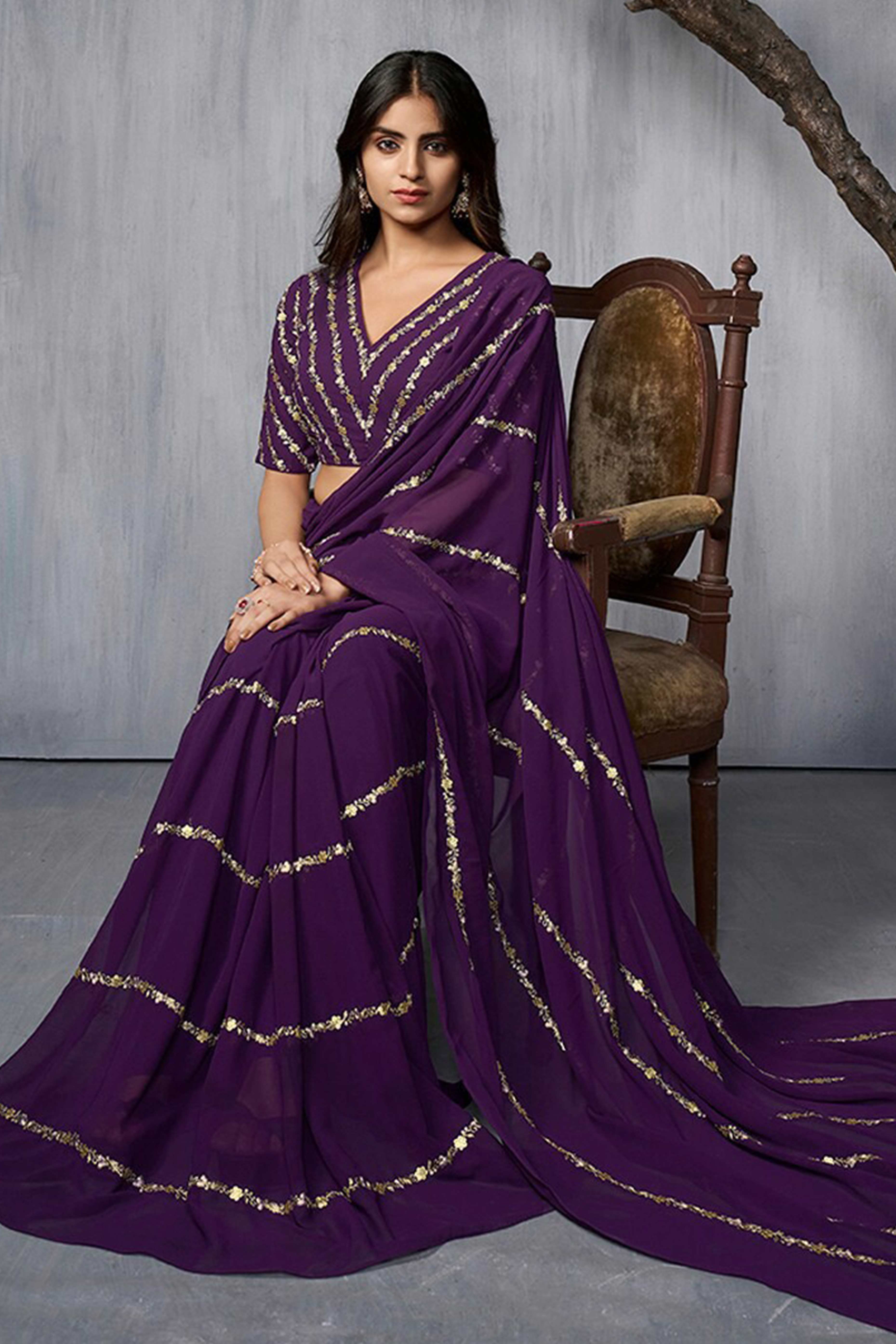 Elegant Purple Floral Georgette Saree Embellished With Fine Sequins Embroidery