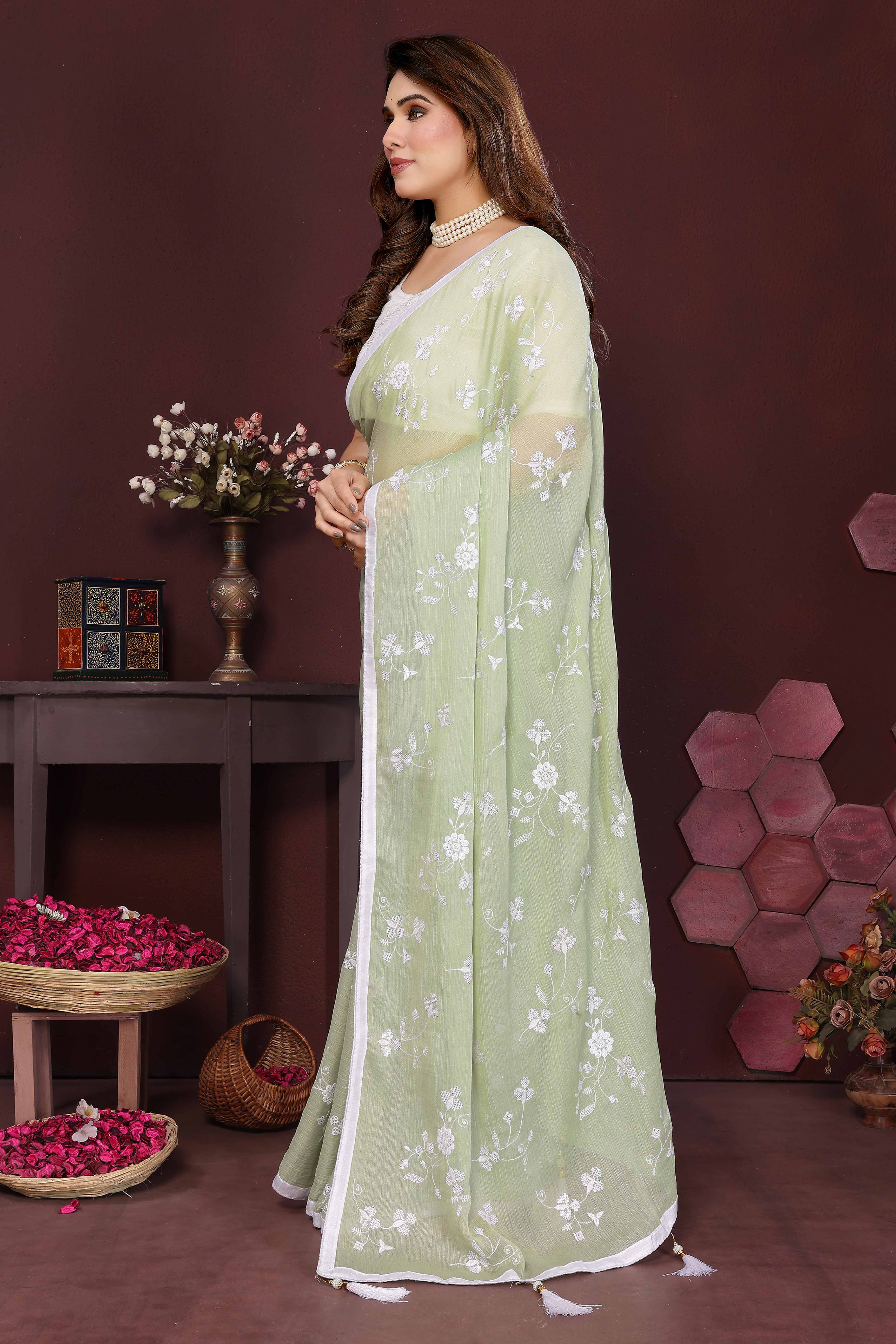 Pista Green Bloom Saree adorned with Moss Floral Embroidery and Delicate Lace Border