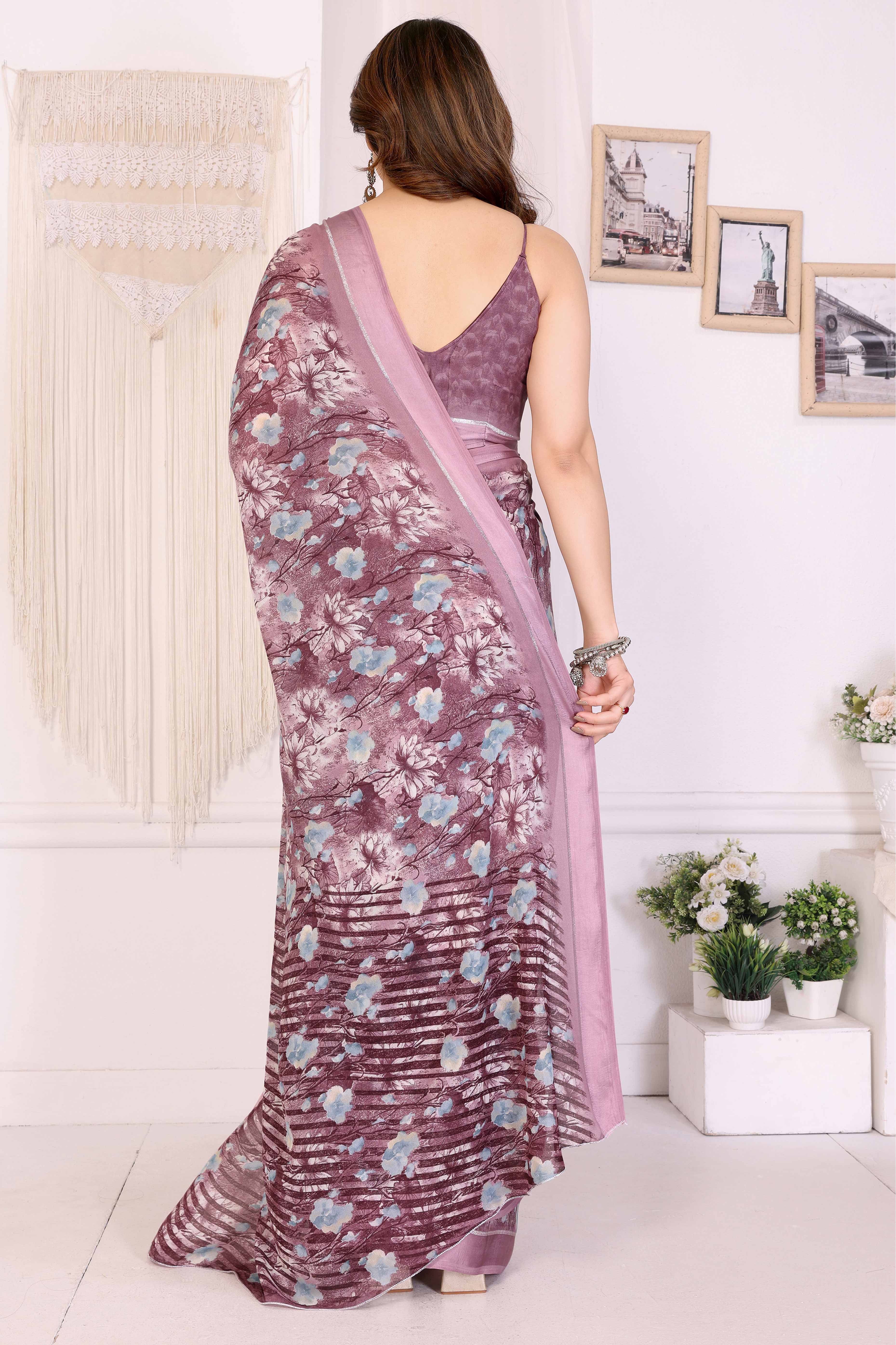 Mauve Floral Printed Blue Crepe Saree Styled With A Smooth Satin Patta Border