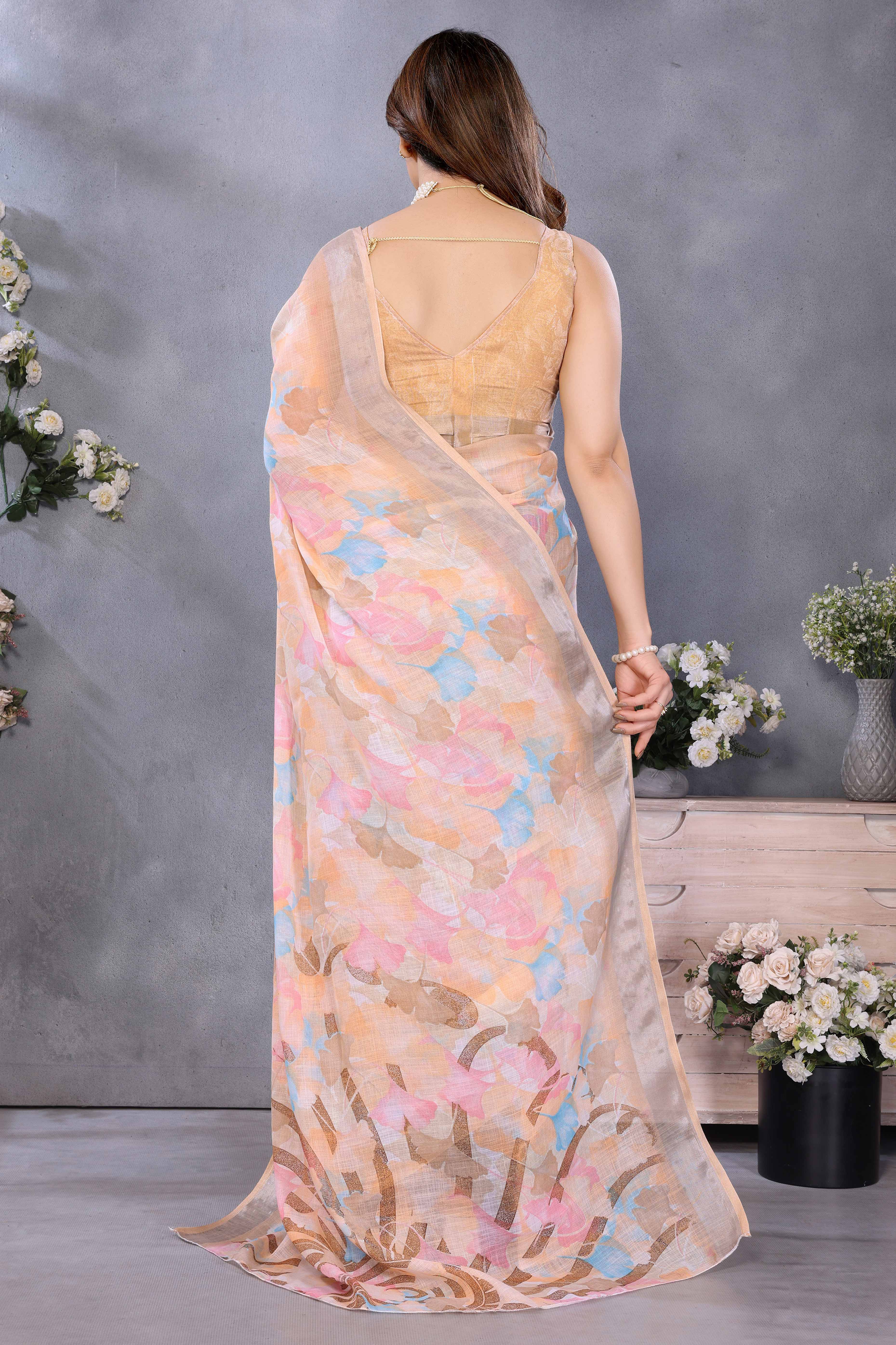 Orange Floral Printed Linen Saree Accented With A Classic Patta Border