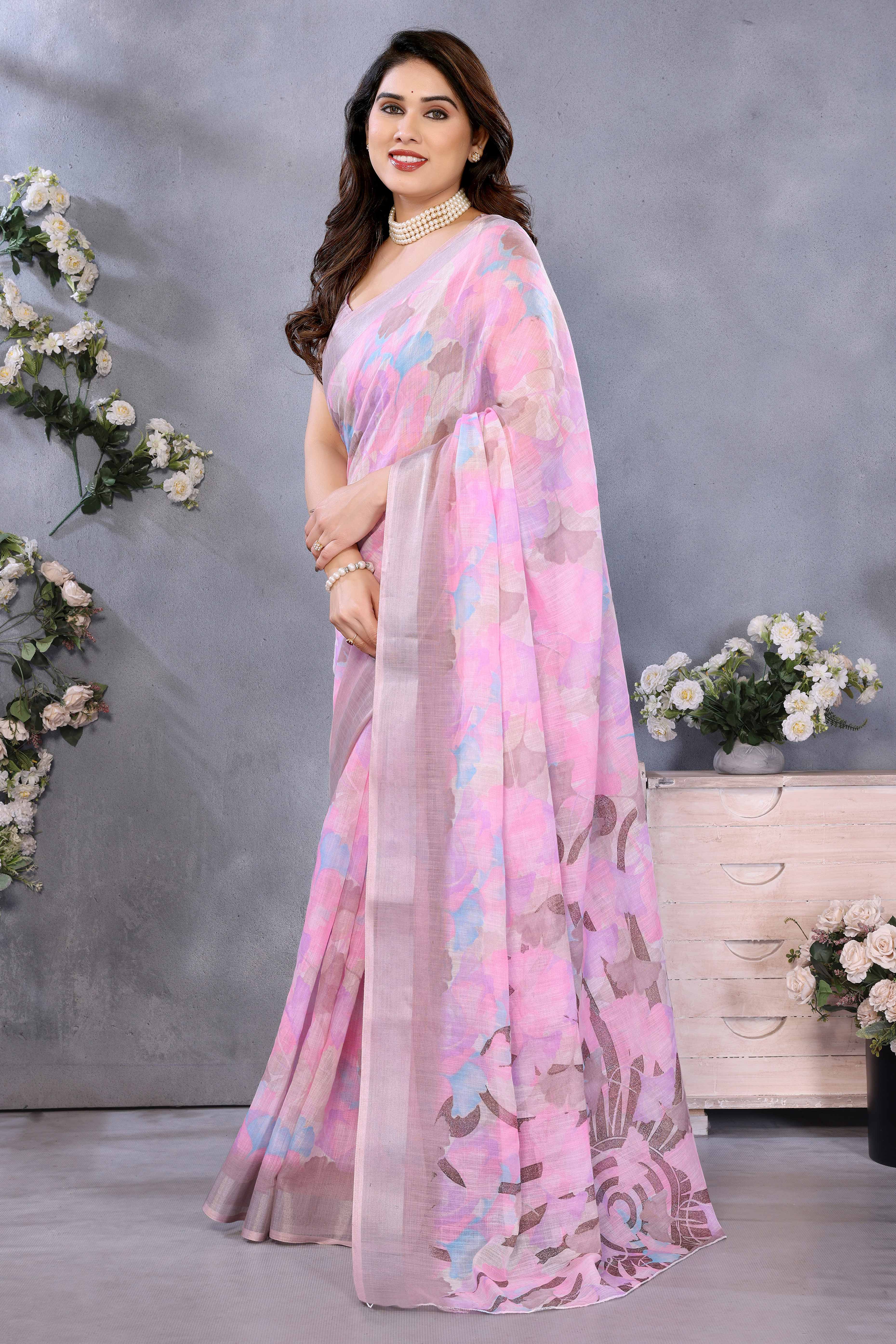 Pink Floral Printed Linen Saree Accented With A Classic Patta Border