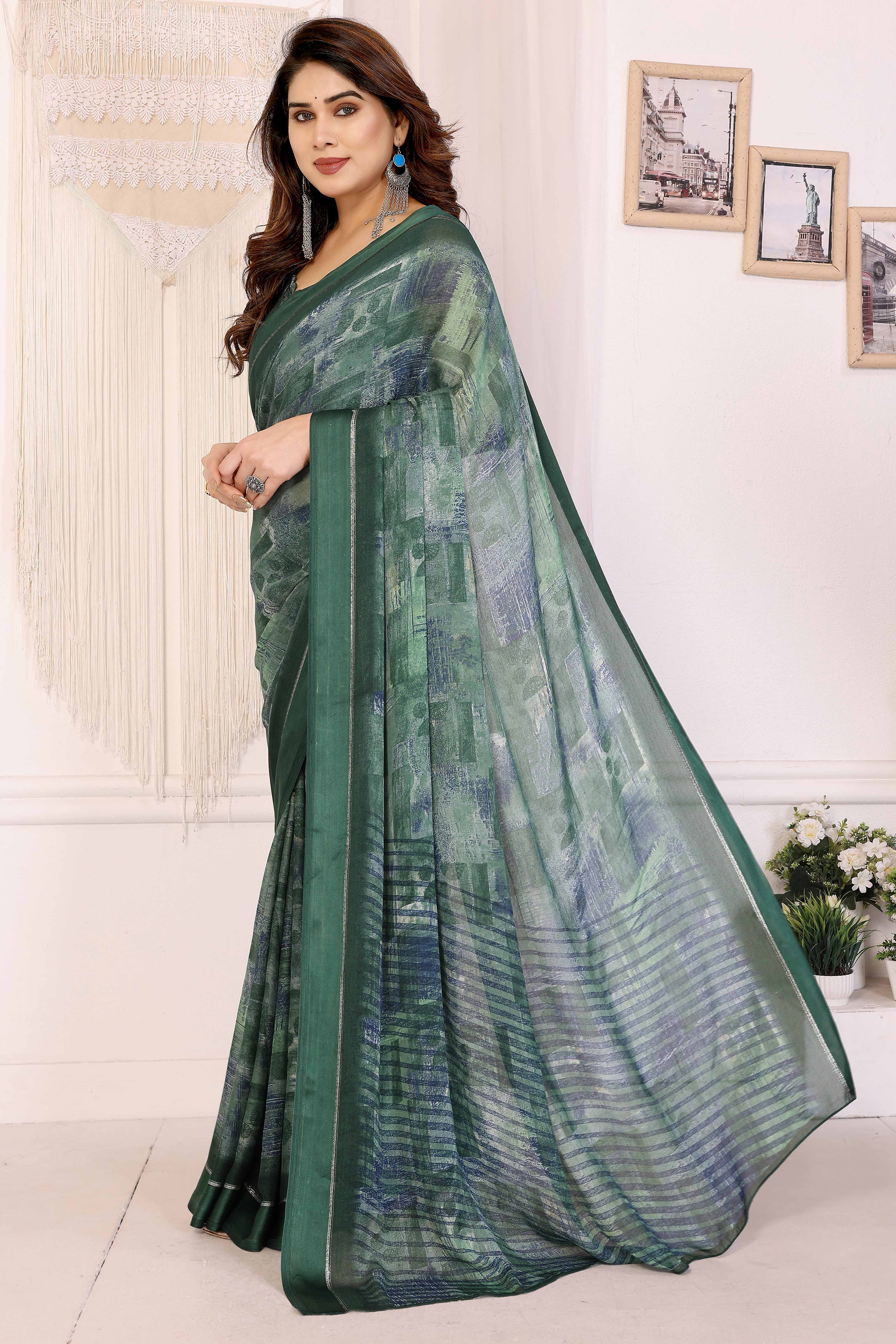 Trendy Green Moss Crepe Saree with Floral Motifs and Satin Border