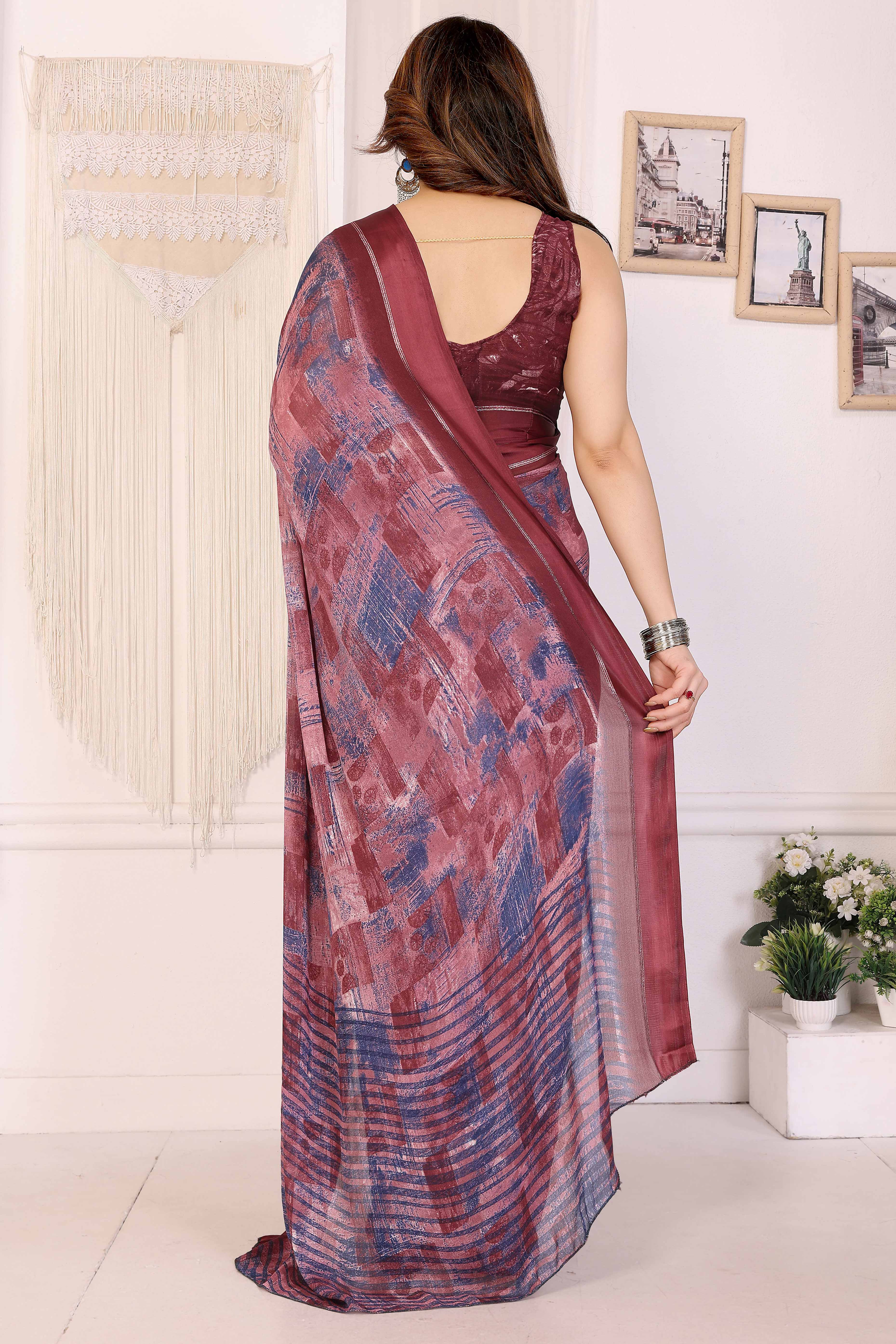 Trendy Maroon Moss Crepe Saree with Floral Motifs and Satin Border