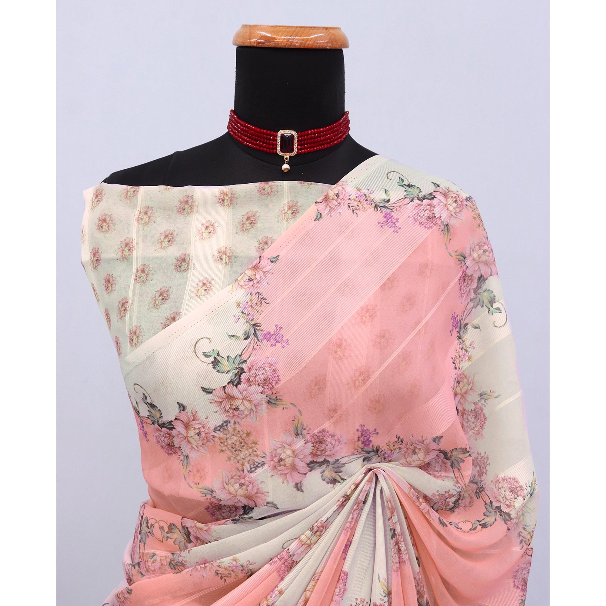 White & Peach Bloom Floral Digital Printed Georgette Saree Accentuated With Graceful Zari Stripes