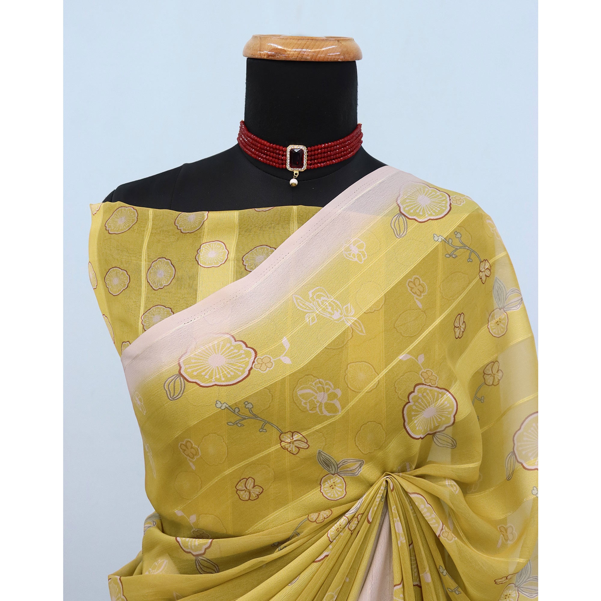 Dark Mustard Bloom Floral Digital Printed Georgette Saree Accentuated With Graceful Zari Stripes