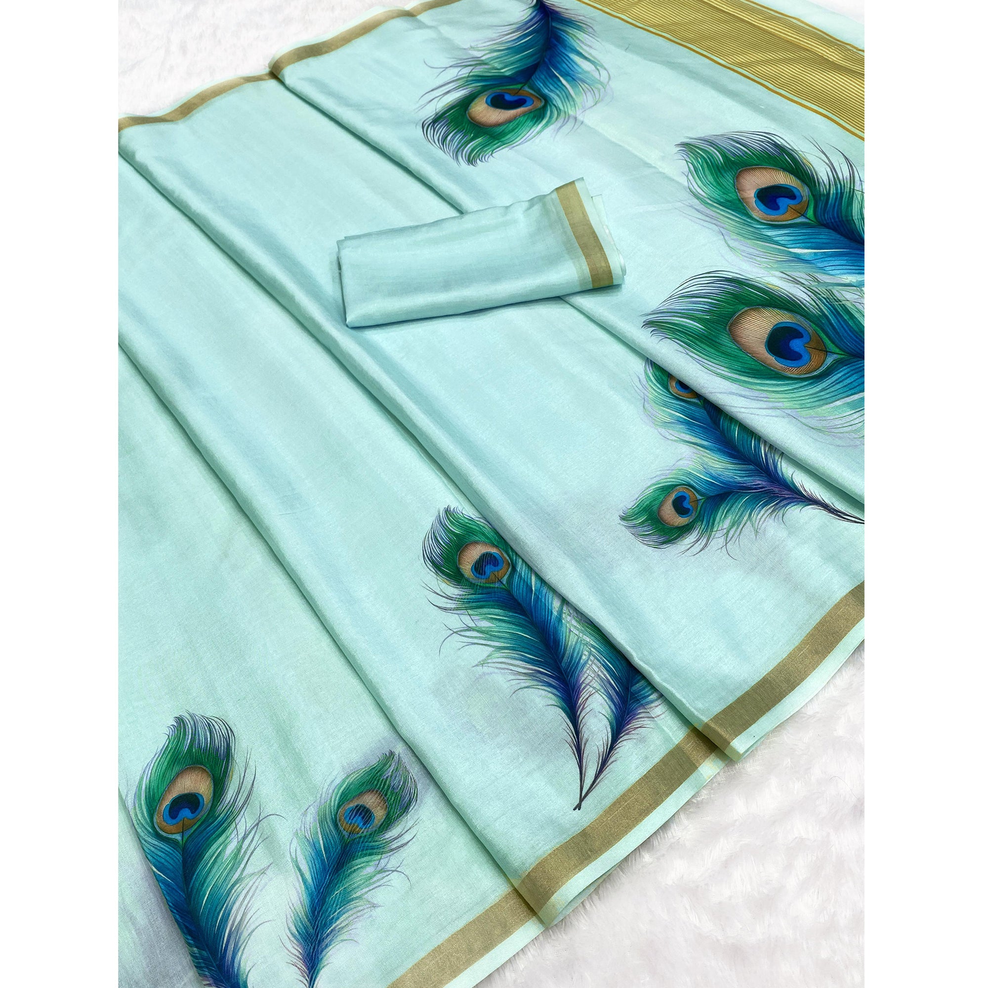 Charming Blue Soft Tussar Cotton Silk Saree With Peacock Feathers Print