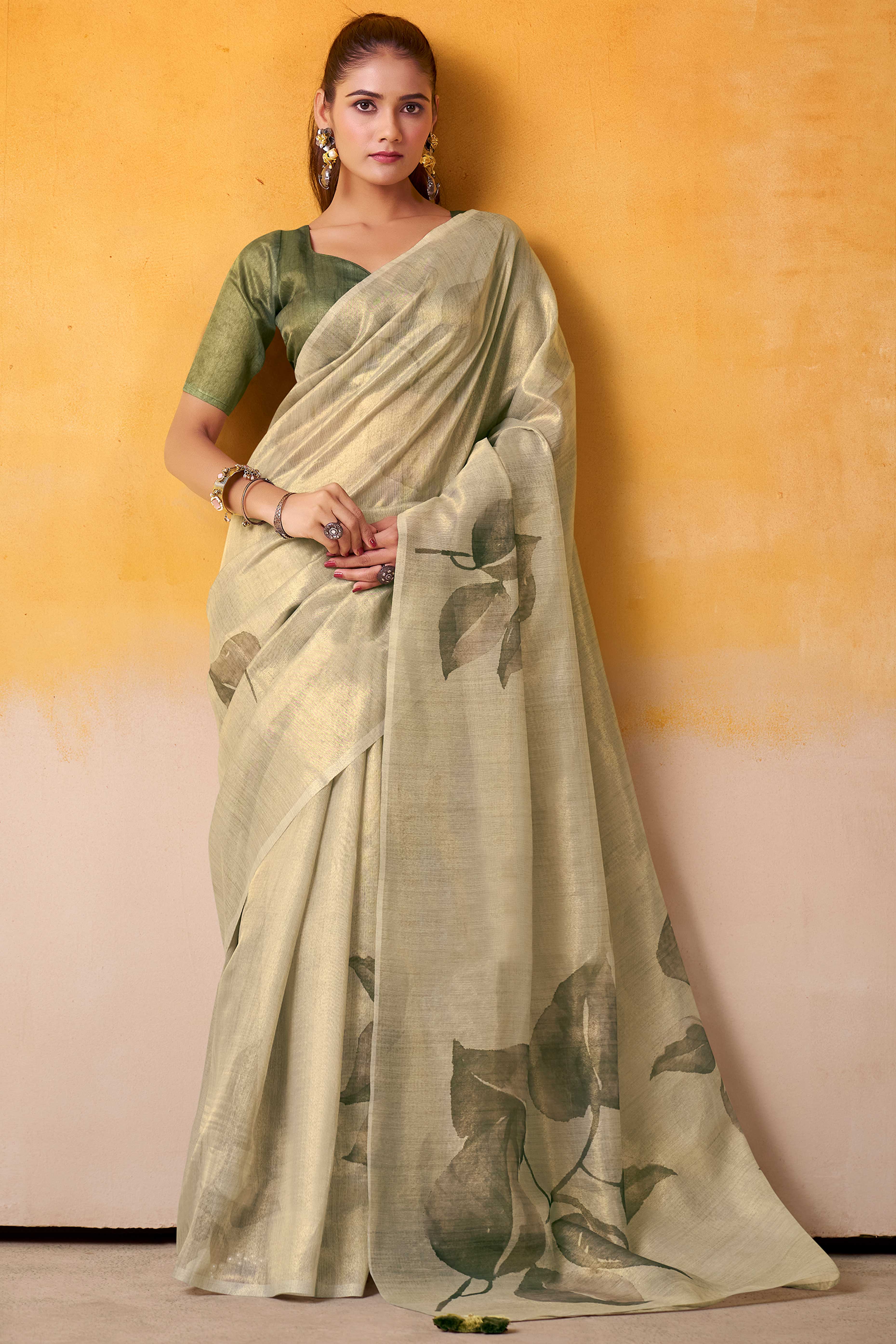 Sophisticated Light Pista Green Floral Digital Print Tissue Saree Enhanced With Handmade Tassels